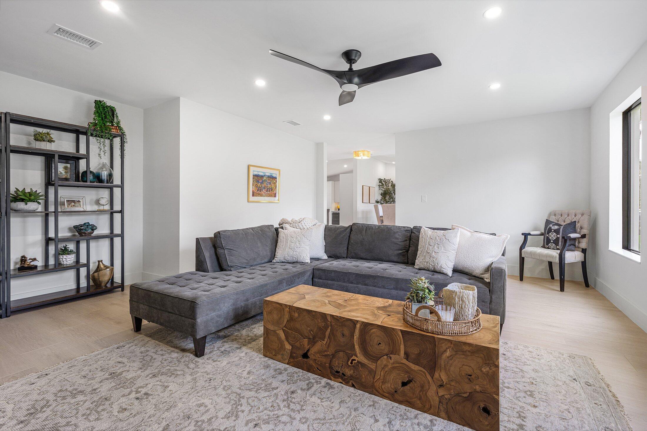 6901 Giralda Circle Boca Raton, FL 33433 - Photo 16 of 83 a living room with furniture and a flat screen tv