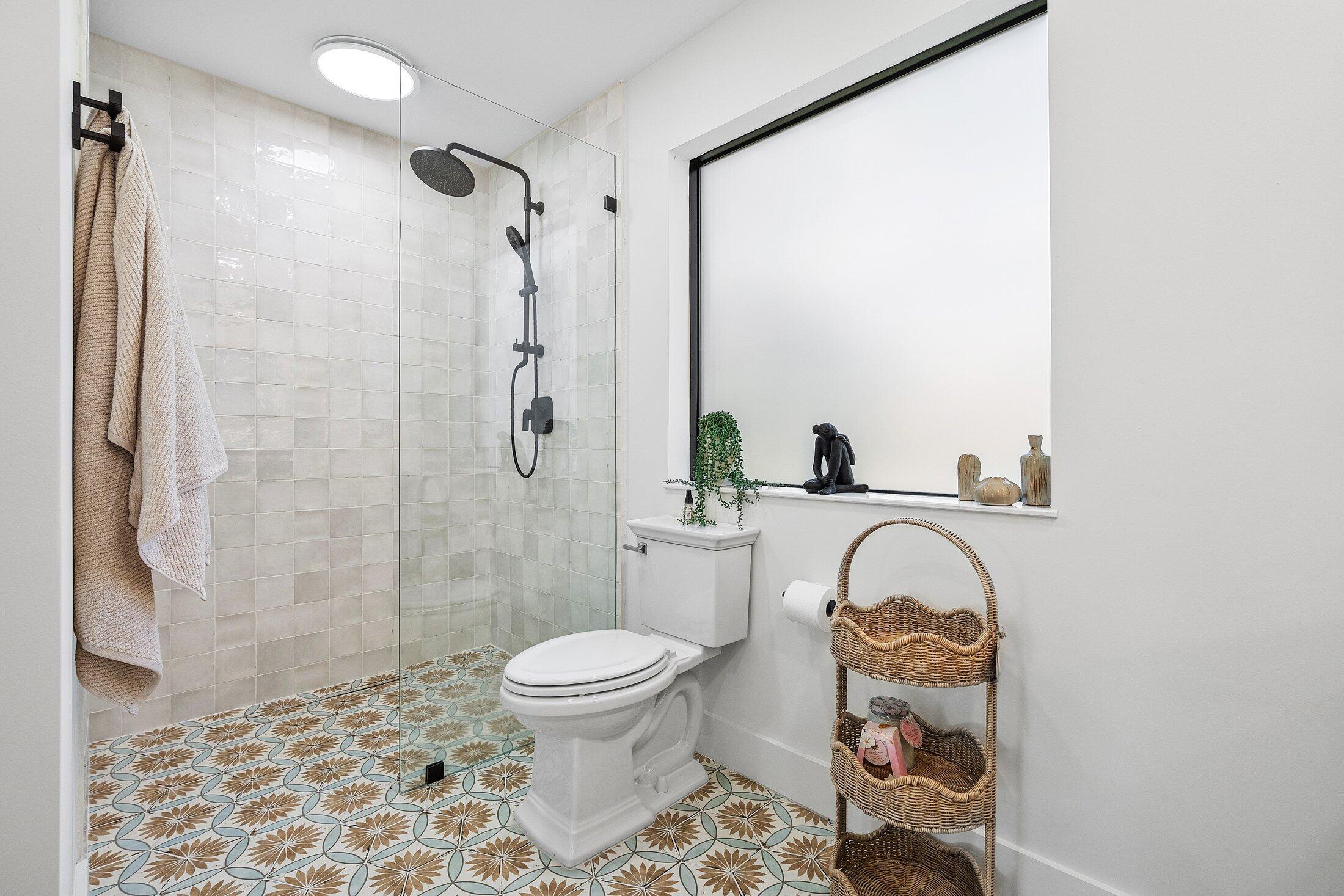 6901 Giralda Circle Boca Raton, FL 33433 - Photo 26 of 83 a bathroom with a sink toilet and shower