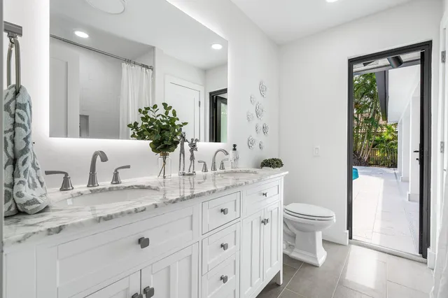 a kitchen with a stove and cabinets