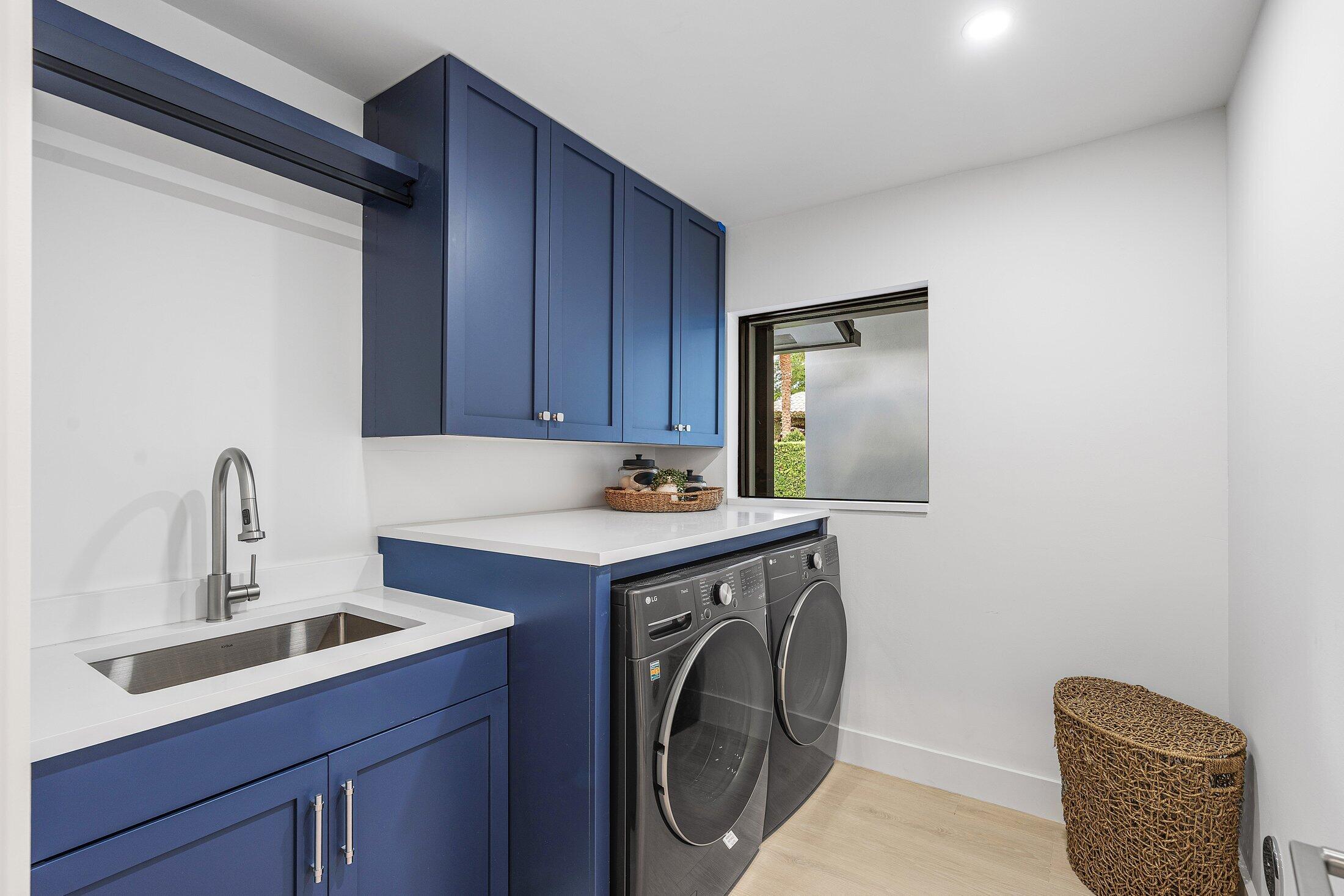 6901 Giralda Circle Boca Raton, FL 33433 - Photo 41 of 83 a utility room with sink dryer and washer