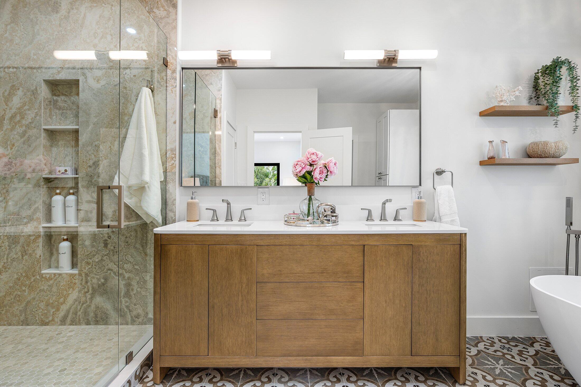 6901 Giralda Circle Boca Raton, FL 33433 - Photo 55 of 83 a bathroom with a granite countertop sink a toilet and a mirror