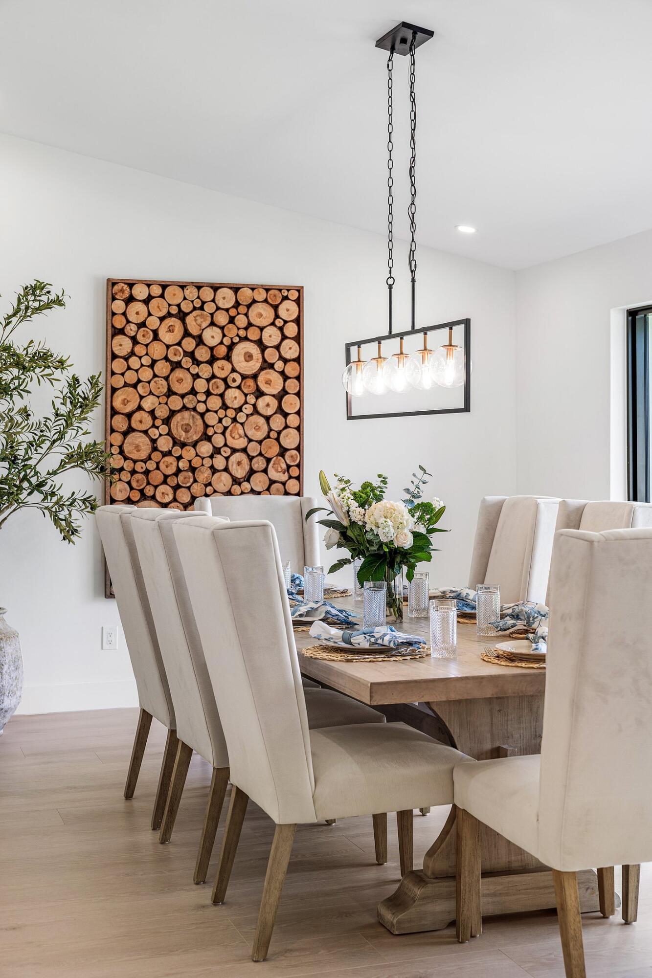6901 Giralda Circle Boca Raton, FL 33433 - Photo 6 of 83 a dining room with furniture and wooden floor