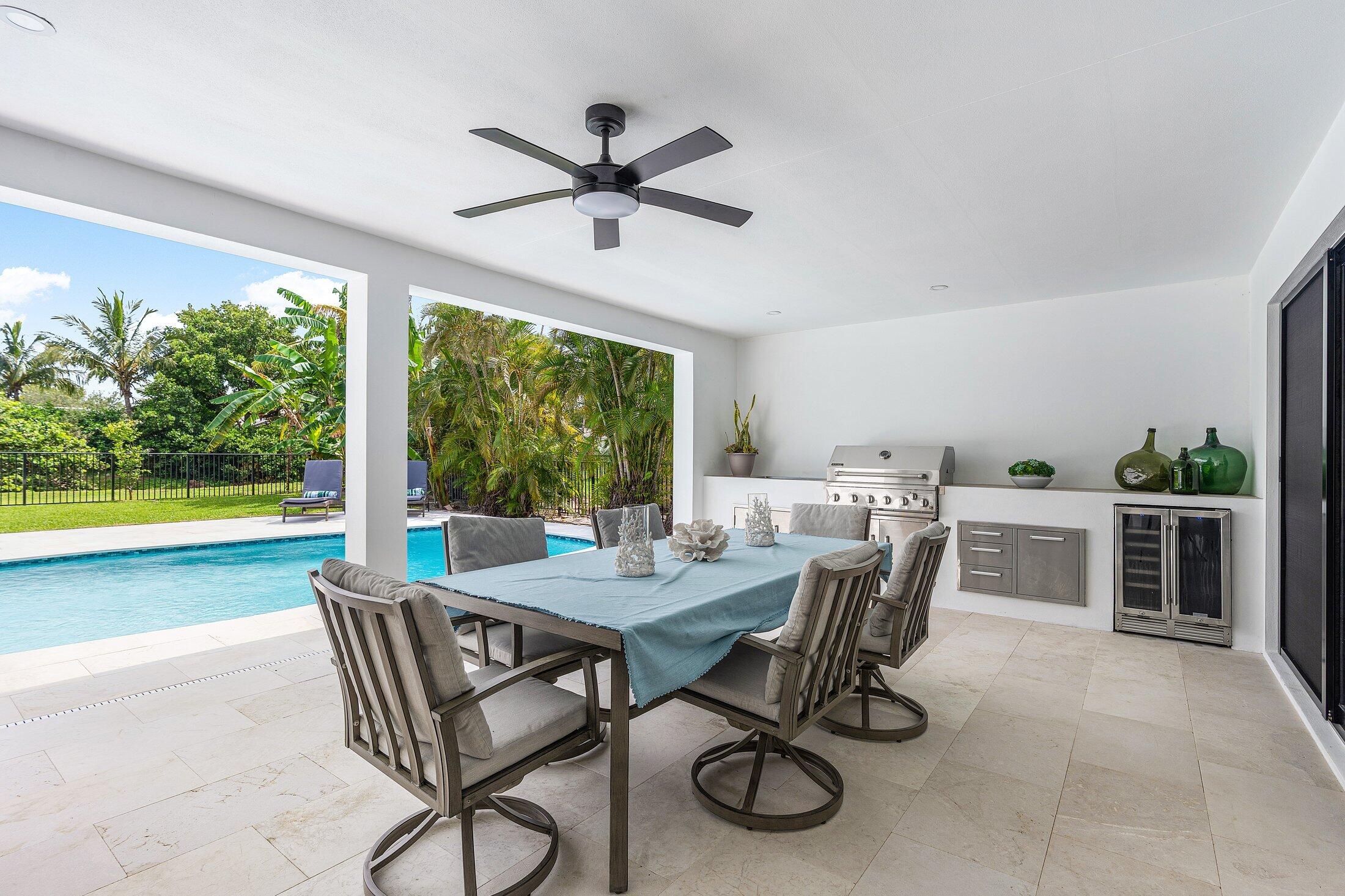 6901 Giralda Circle Boca Raton, FL 33433 - Photo 62 of 83 a view of a dining room with furniture window and outside view