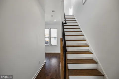 a view of entryway with wooden floor
