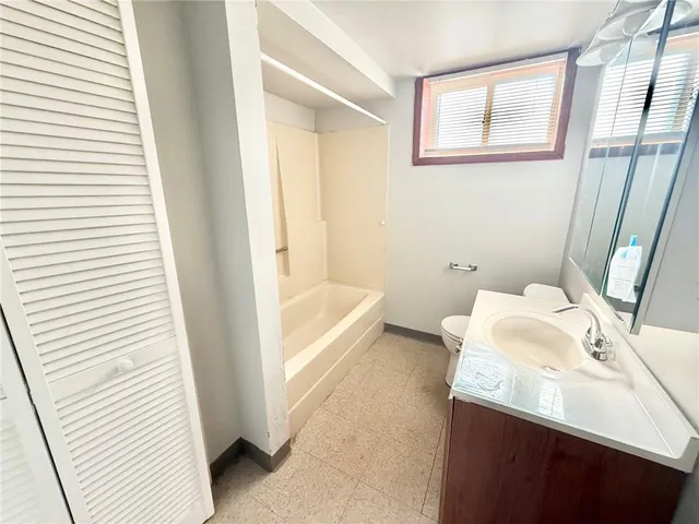 a bathroom with a sink and a bathtub