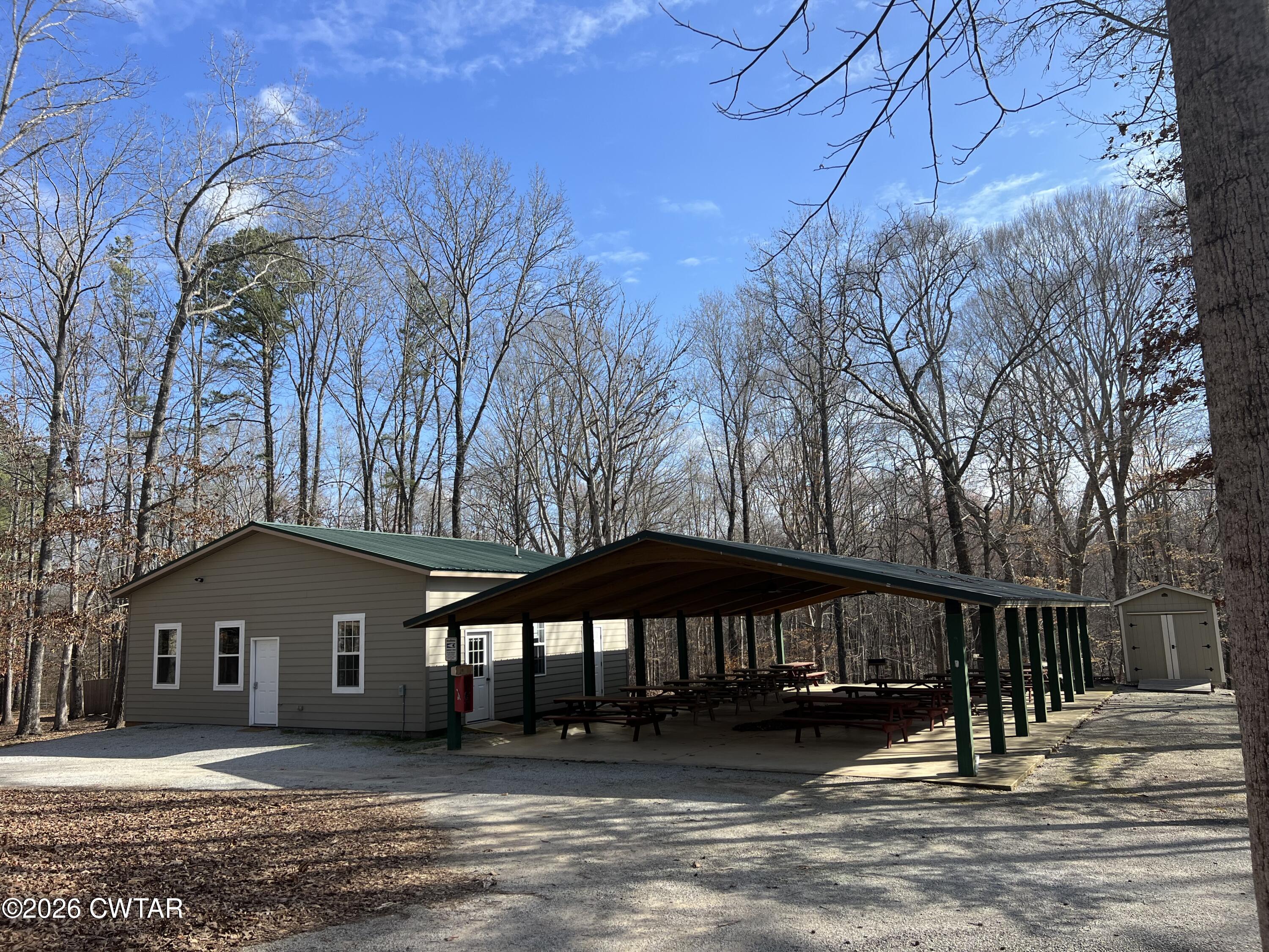 0 Excalibur Trail Cedar Grove, TN 38321 - Photo 13 of 15 a front view of a house with a yard