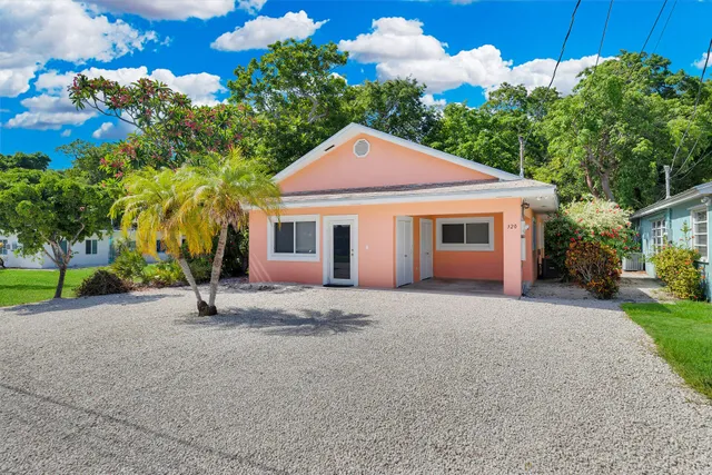 a view of a kitchen with a sink and cabinets