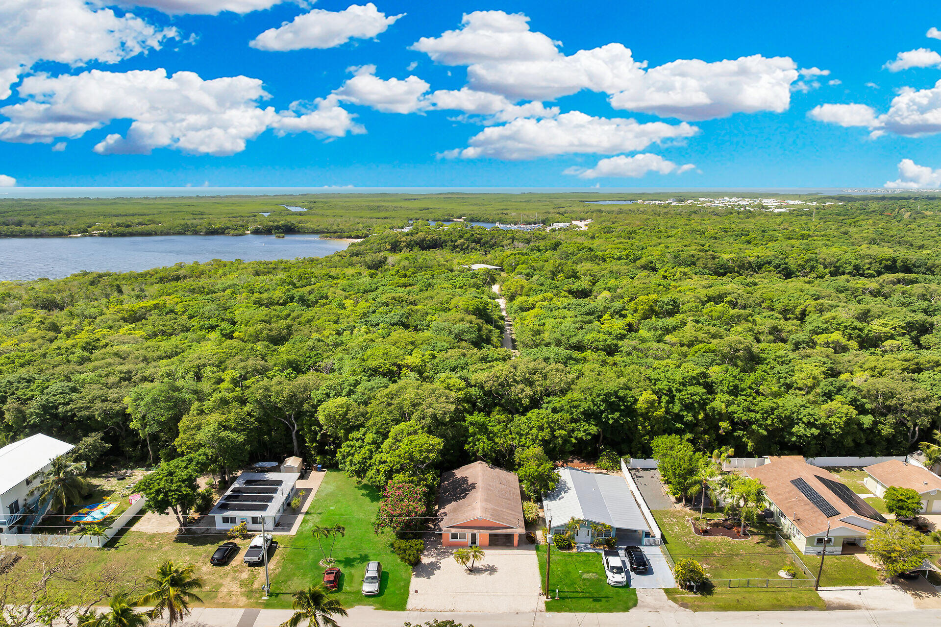 320 Sound Drive Key Largo, FL 33037 - Photo 2 of 48 a view of an outdoor space and mountain view