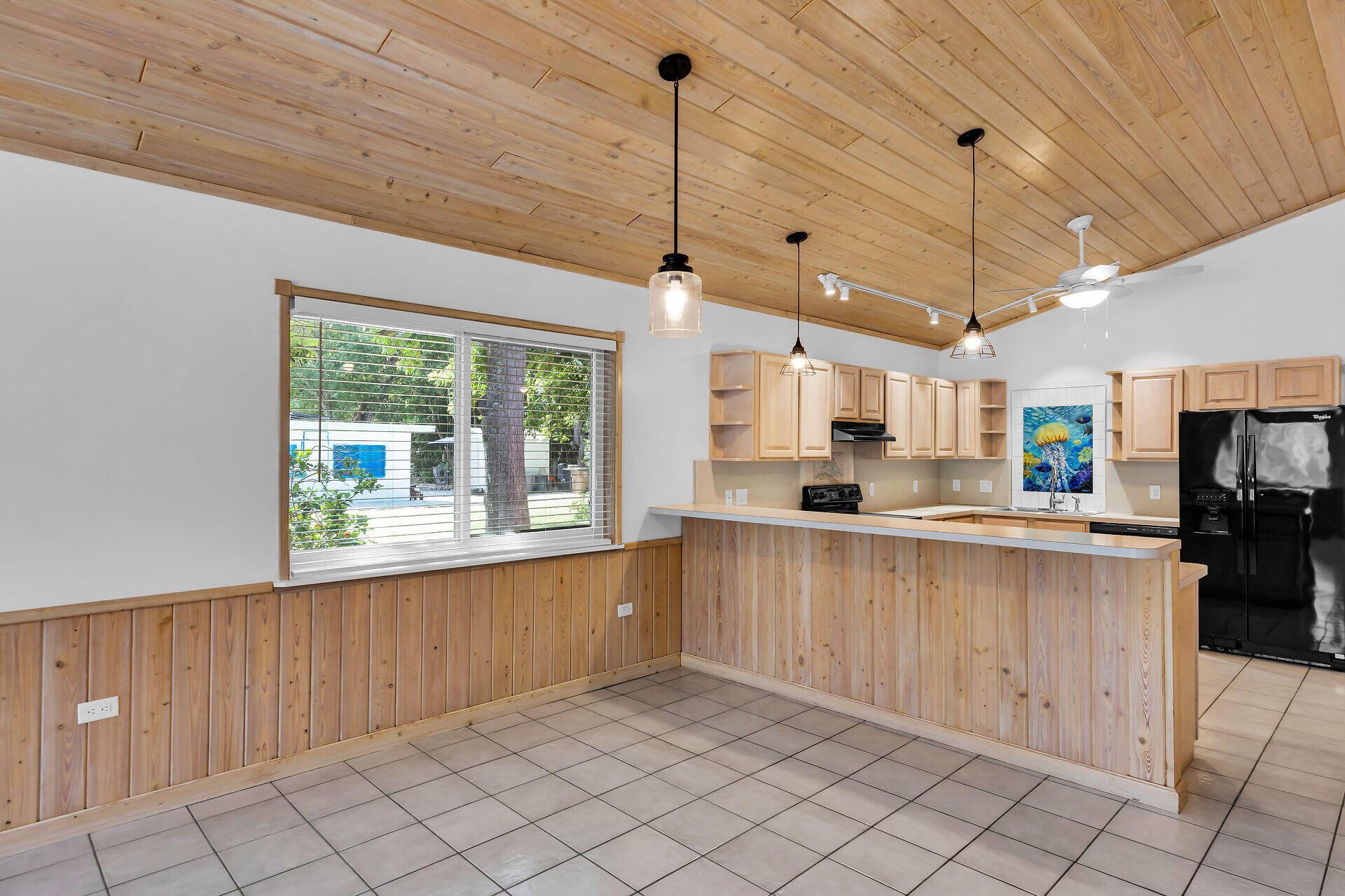 320 Sound Drive Key Largo, FL 33037 - Photo 23 of 48 a large kitchen with kitchen island granite countertop lots of counter space and cabinets
