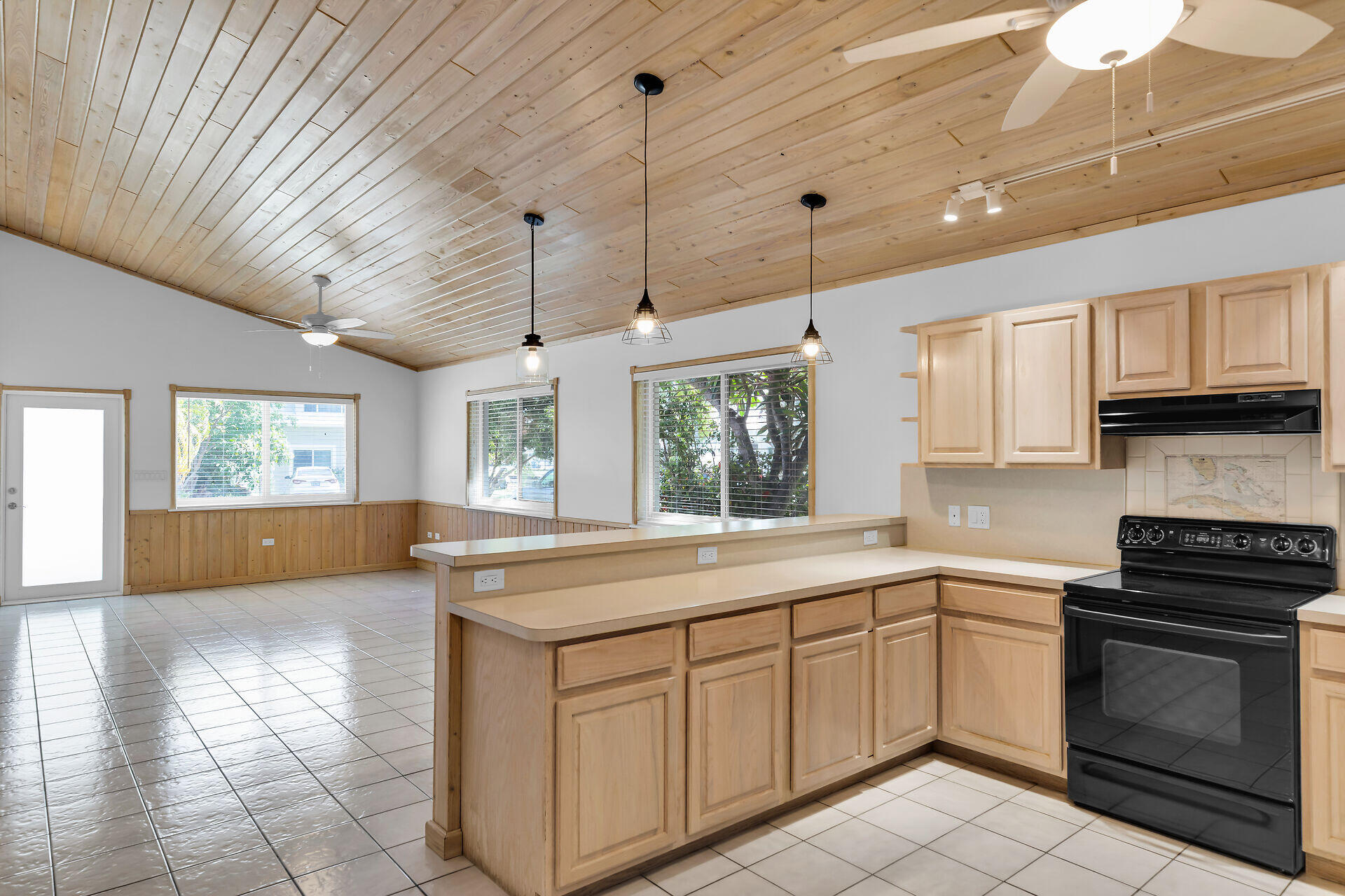 320 Sound Drive Key Largo, FL 33037 - Photo 27 of 48 a kitchen with a sink stove and microwave