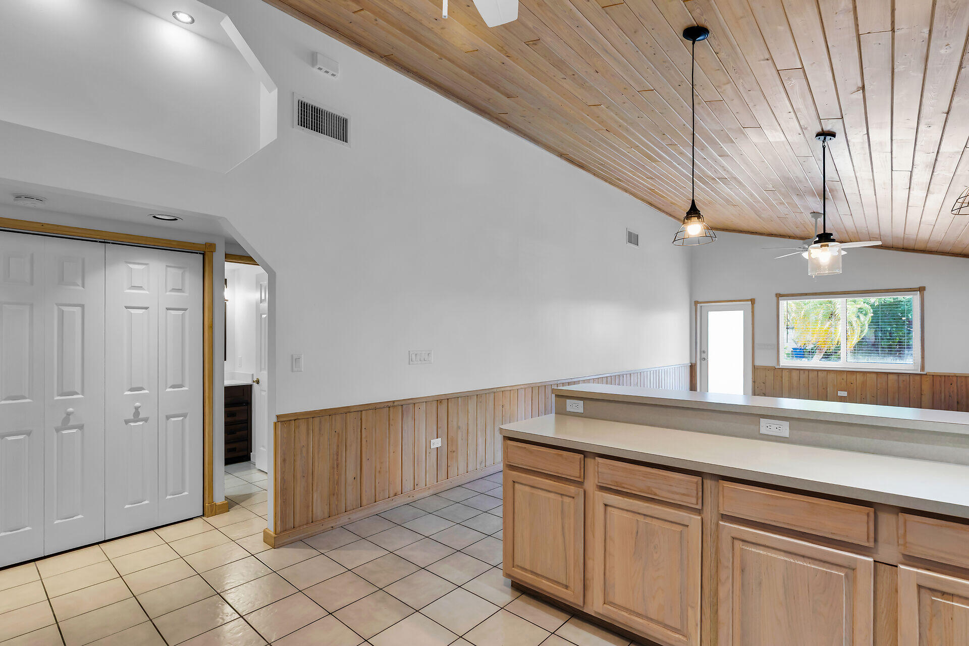 320 Sound Drive Key Largo, FL 33037 - Photo 28 of 48 a kitchen with cabinets and window