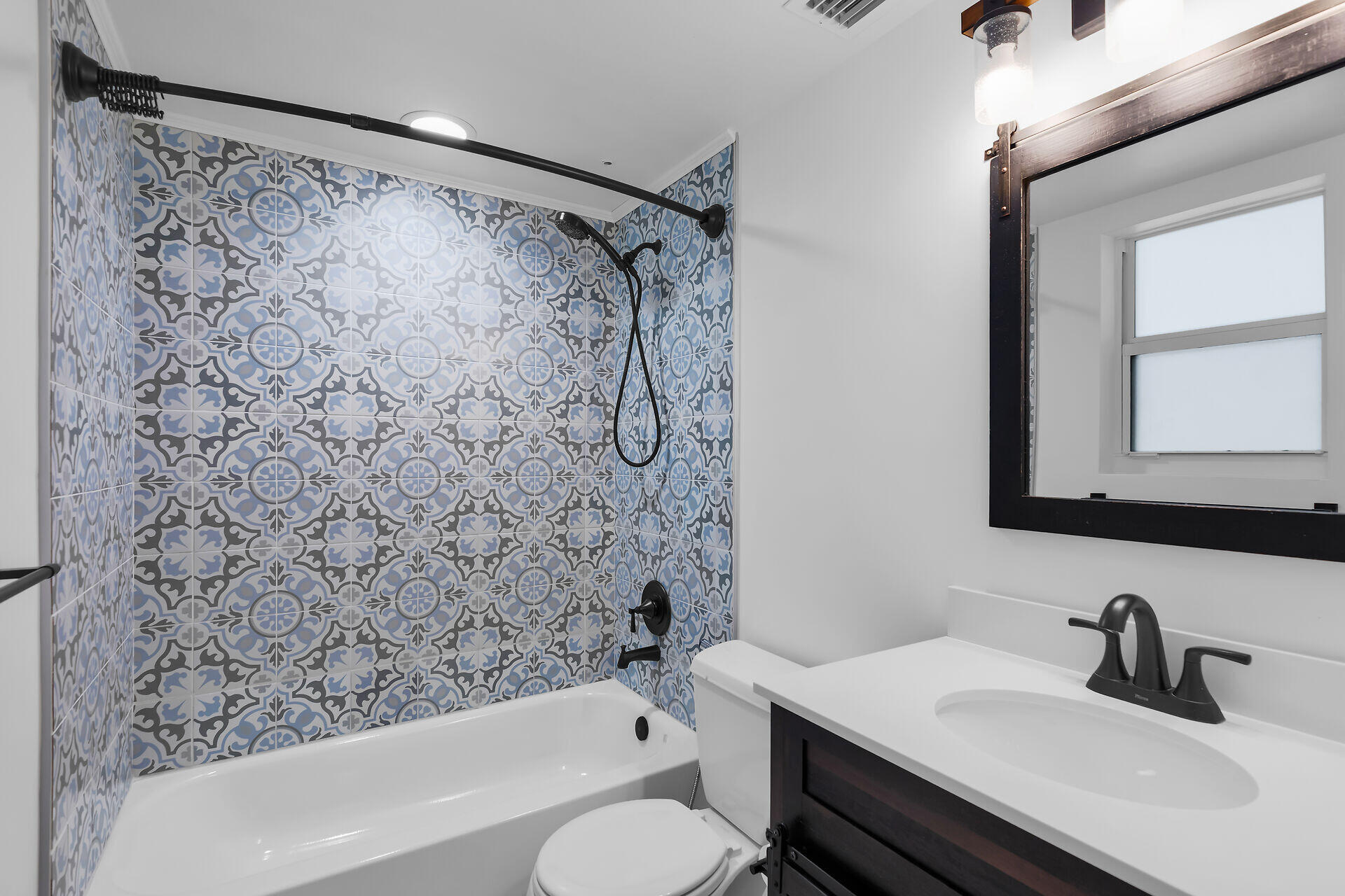 320 Sound Drive Key Largo, FL 33037 - Photo 33 of 48 a bathroom with a sink and a mirror