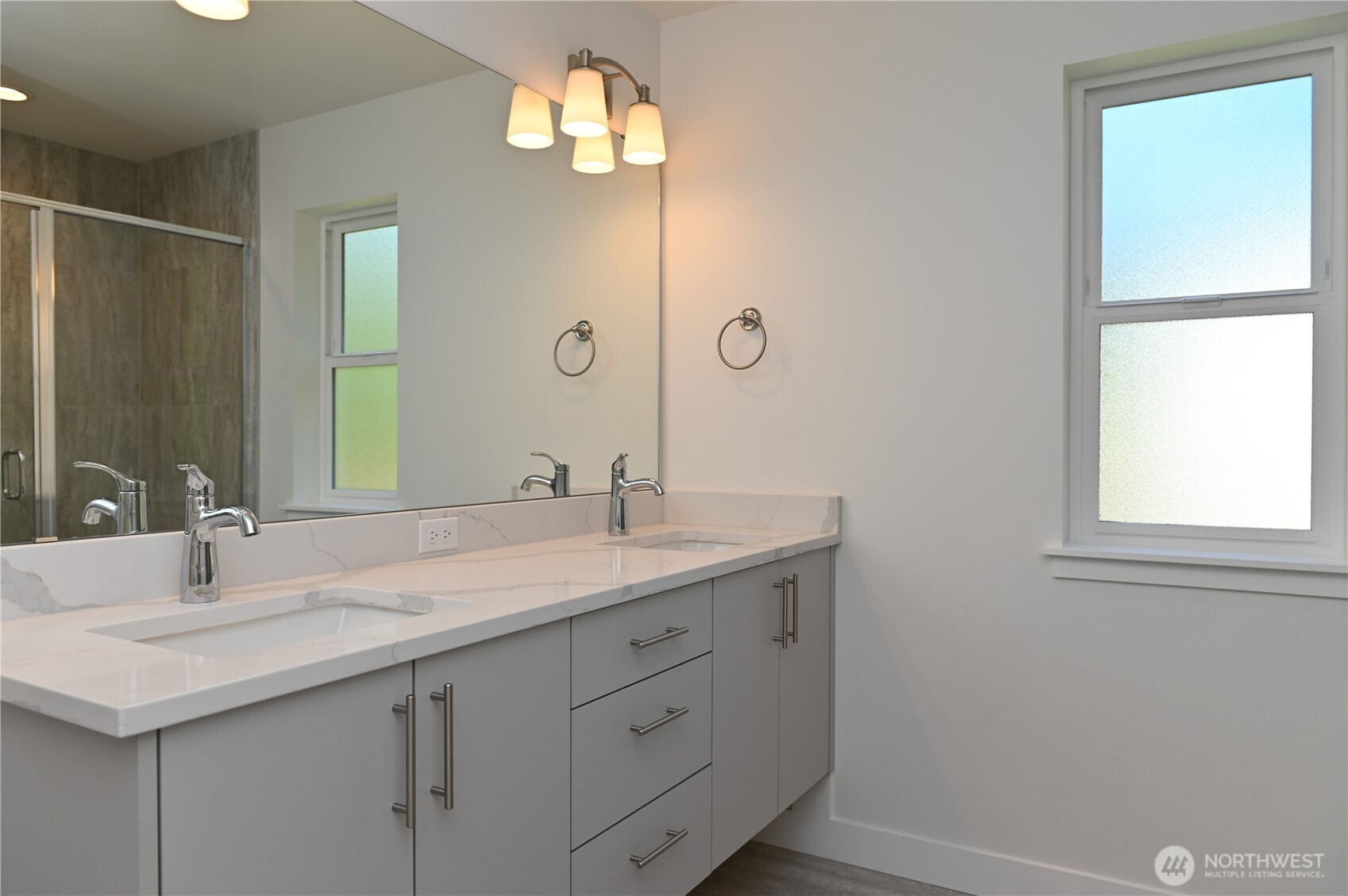 1323 Roland Street Bellingham, WA 98229 - Photo 14 of 16 a bathroom with a sink and a mirror