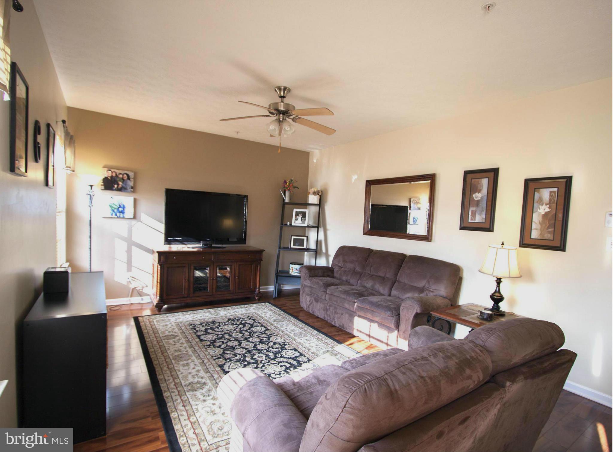 9653 Biggs Road Baltimore, MD 21220 - Photo 4 of 22 a living room with furniture and a flat screen tv