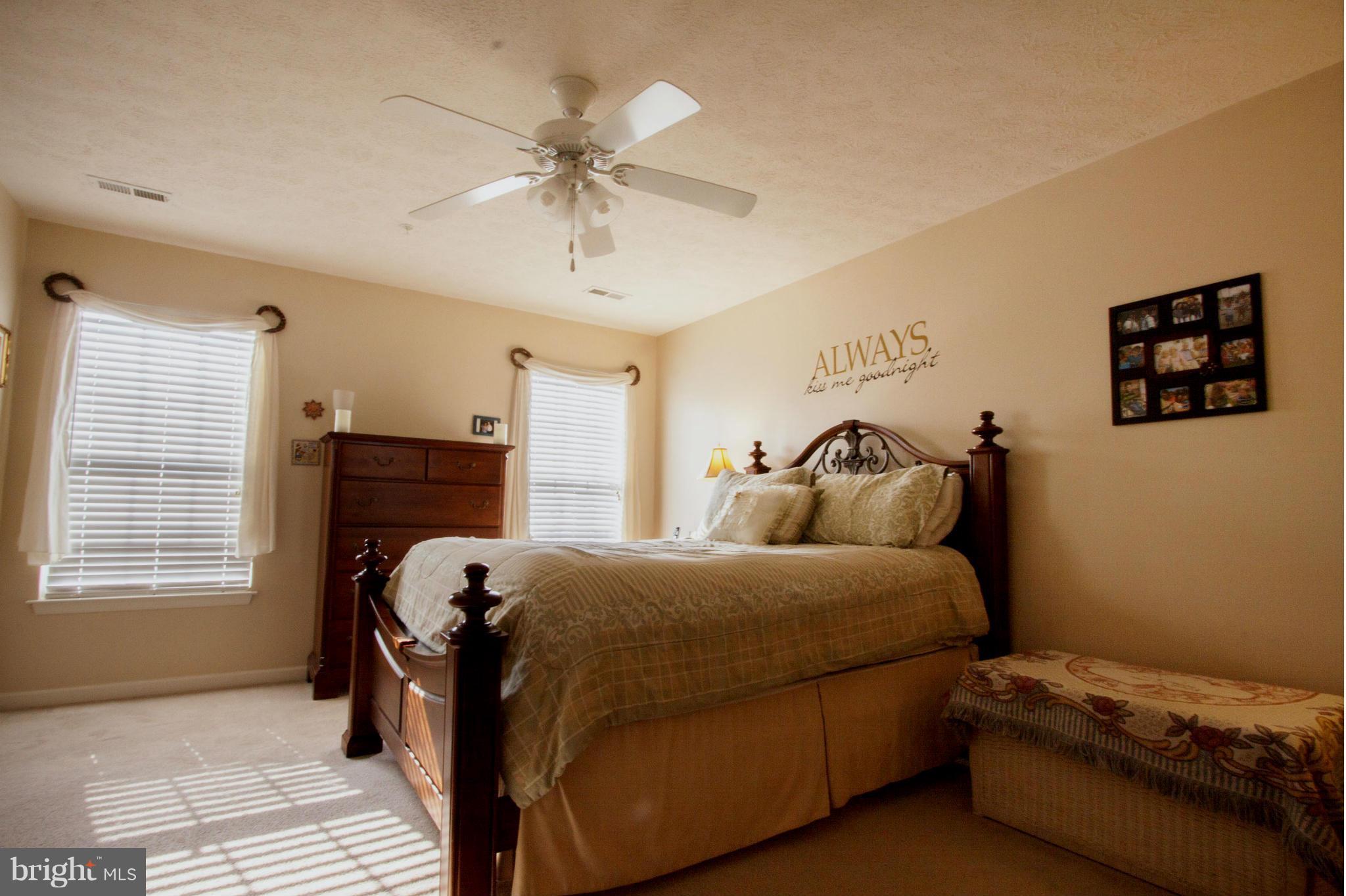 9653 Biggs Road Baltimore, MD 21220 - Photo 8 of 22 a bed room with a bed and a window