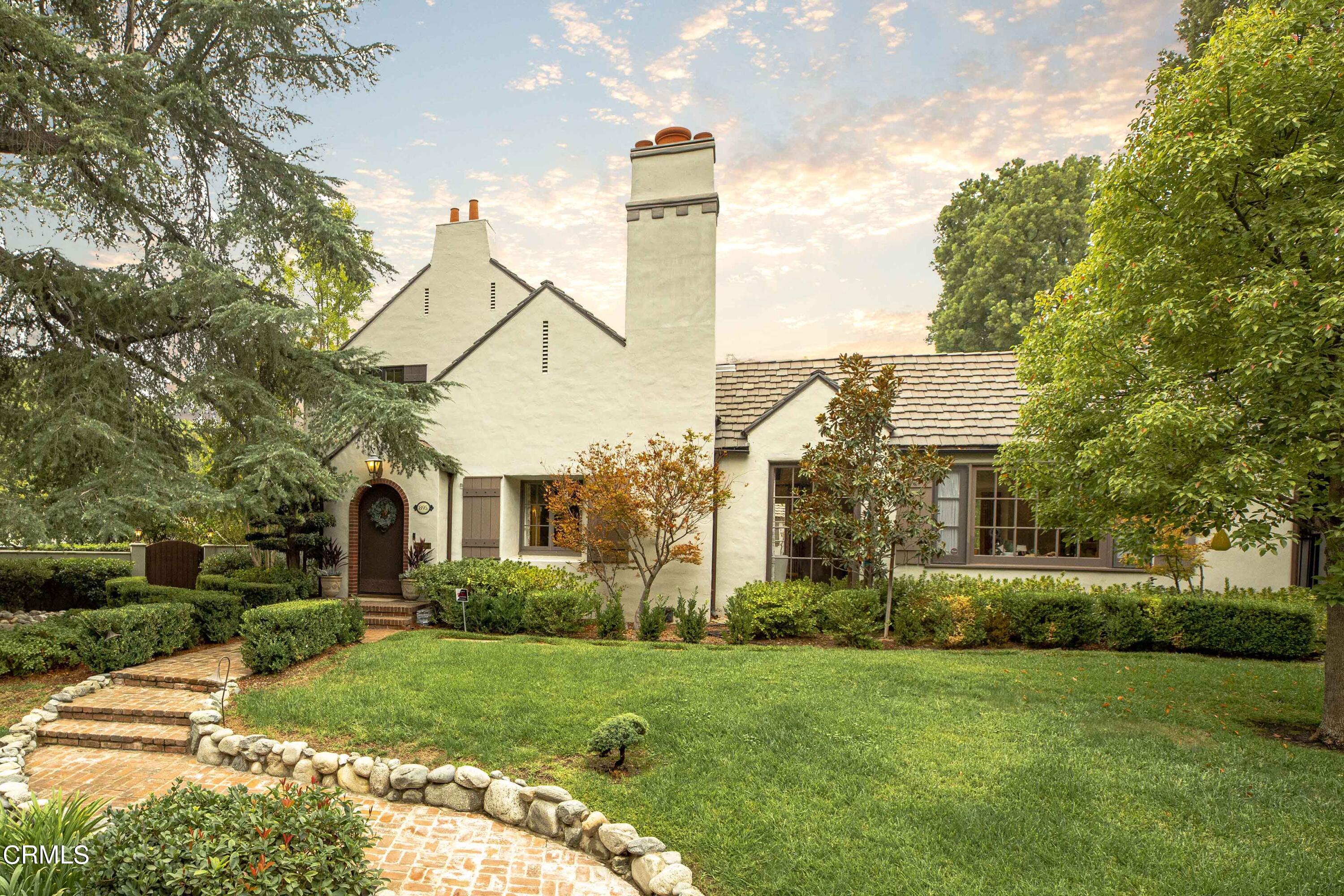 Undisclosed Address Pasadena, CA 91106 - Photo 1 of 40 a view of a house with a yard and plants