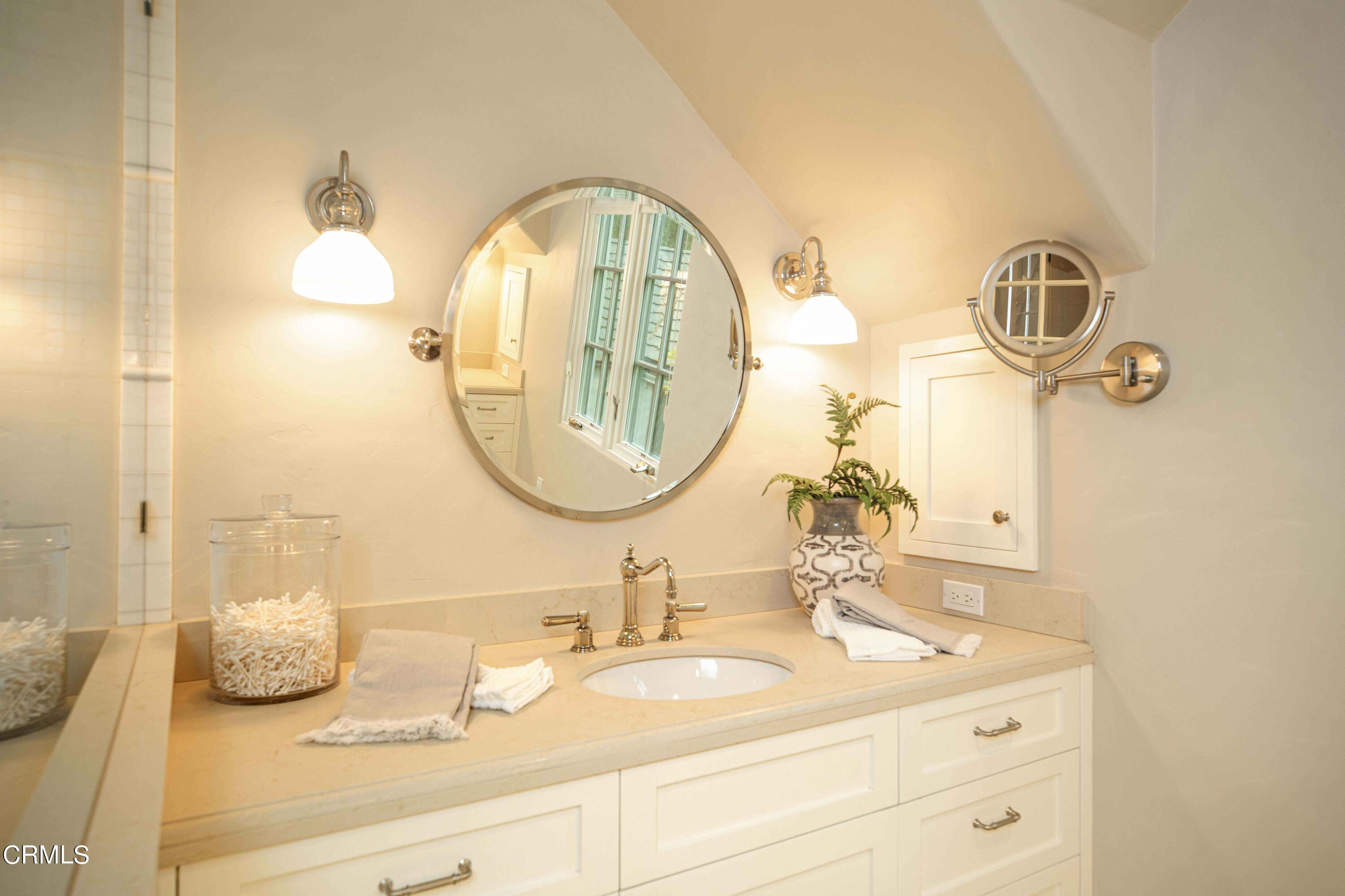 Undisclosed Address Pasadena, CA 91106 - Photo 25 of 40 a bathroom with a sink and a mirror