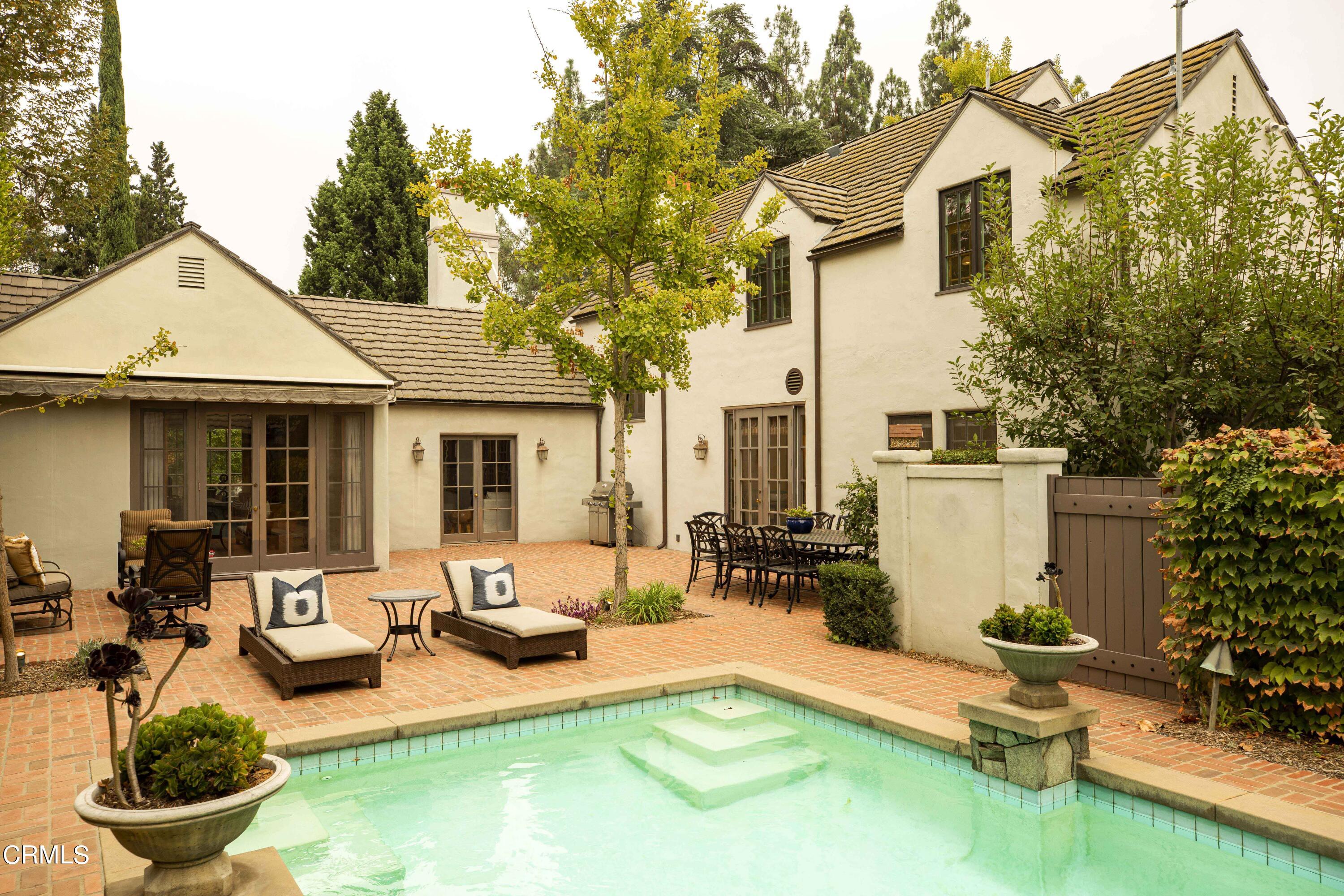 Undisclosed Address Pasadena, CA 91106 - Photo 31 of 40 a view of a house with swimming pool and sitting area