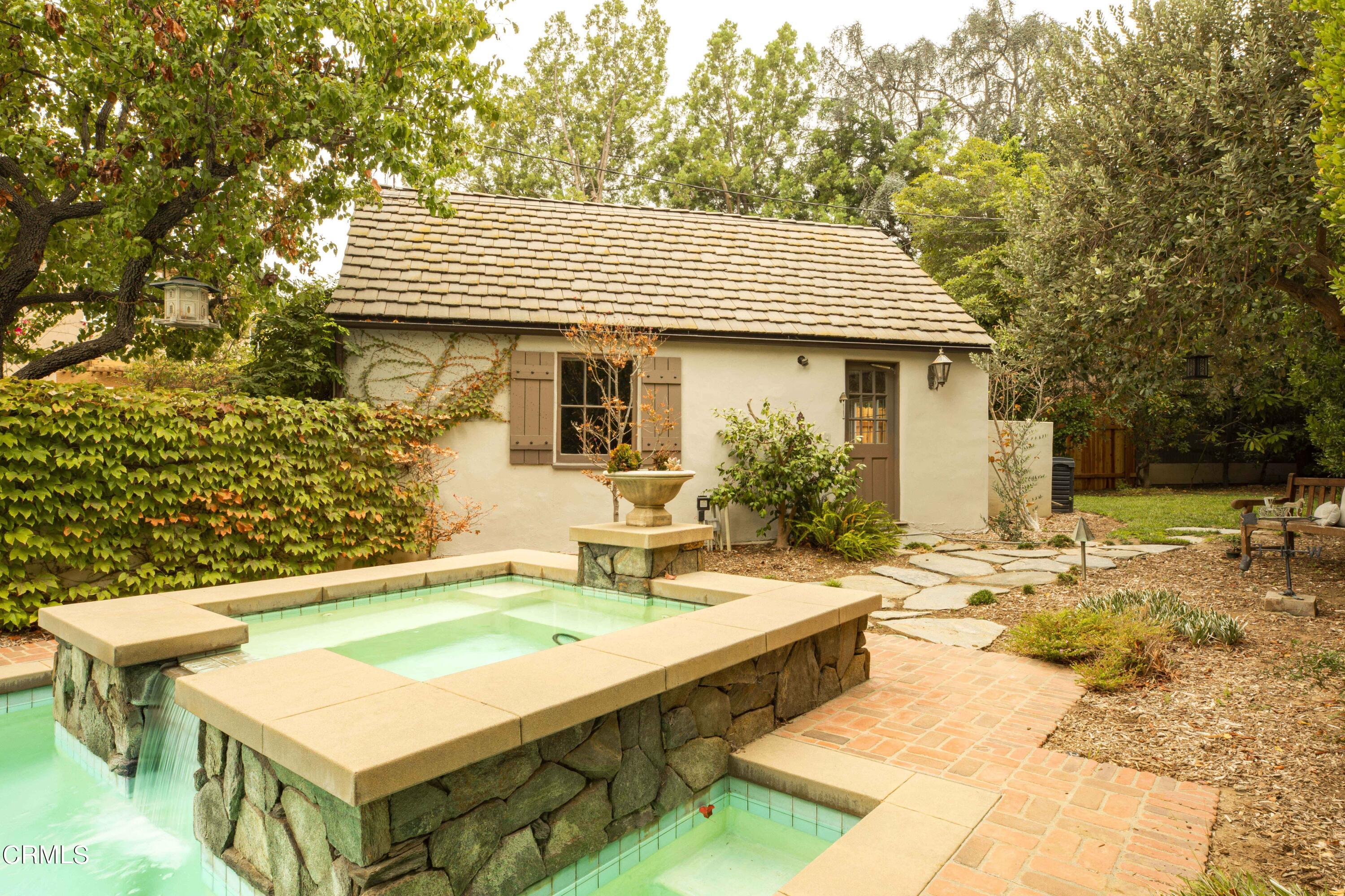 Undisclosed Address Pasadena, CA 91106 - Photo 33 of 40 a view of a house with pool and chairs