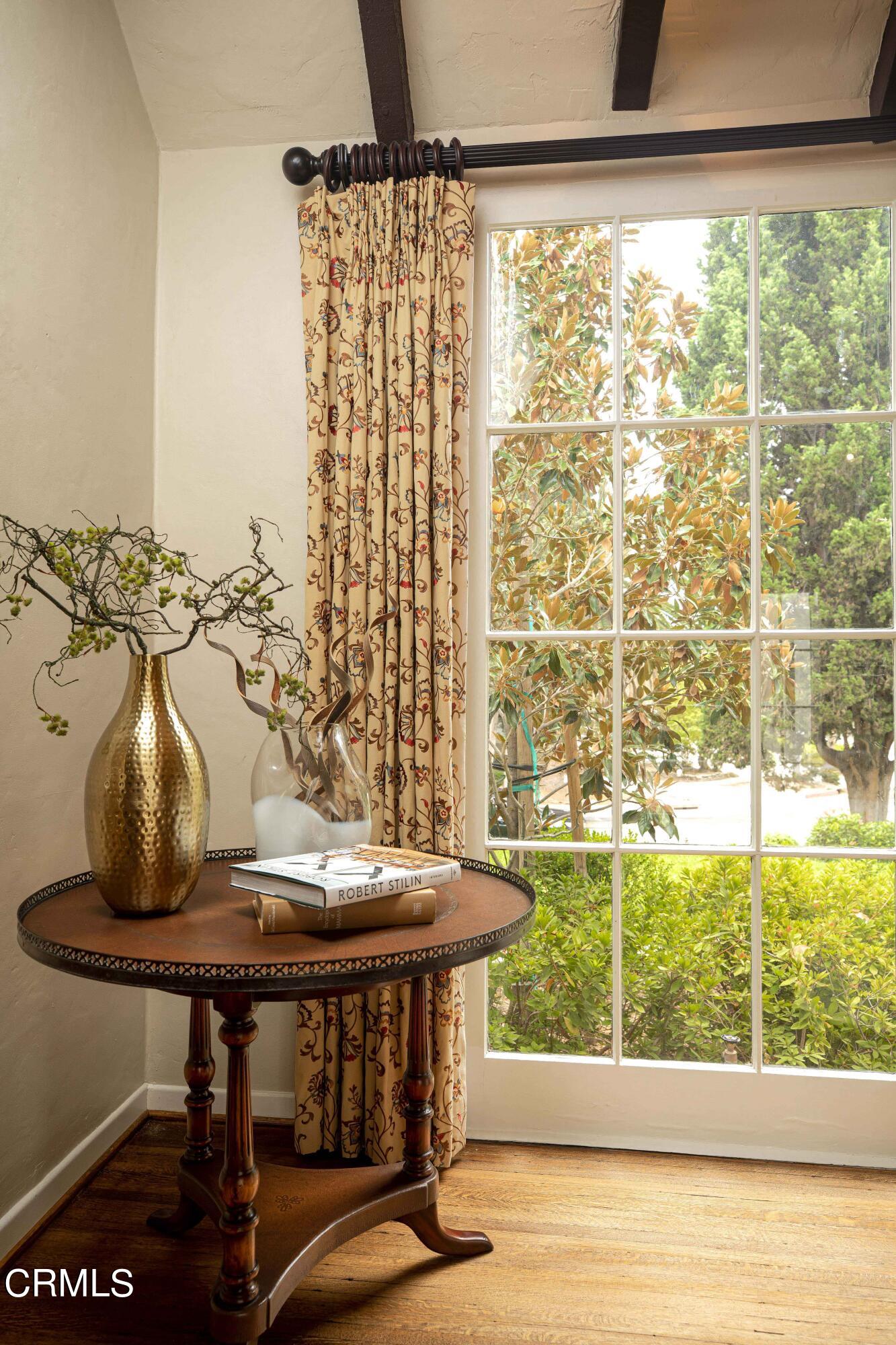 Undisclosed Address Pasadena, CA 91106 - Photo 9 of 40 a view of a room with a table and chairs