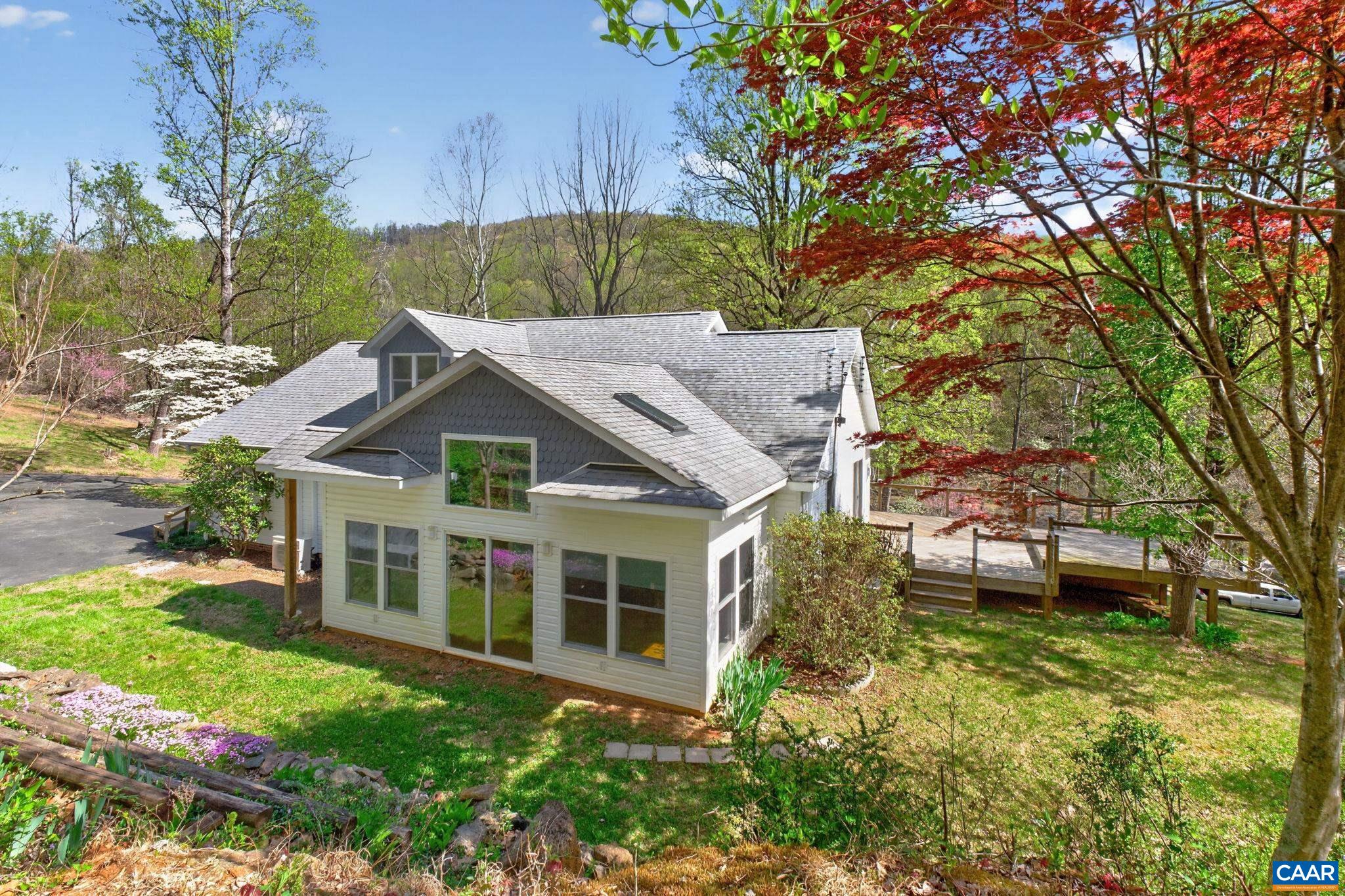 689 Mutton Hollow Road Stanardsville, VA 22973 - Photo 12 of 61 a aerial view of a house with a garden