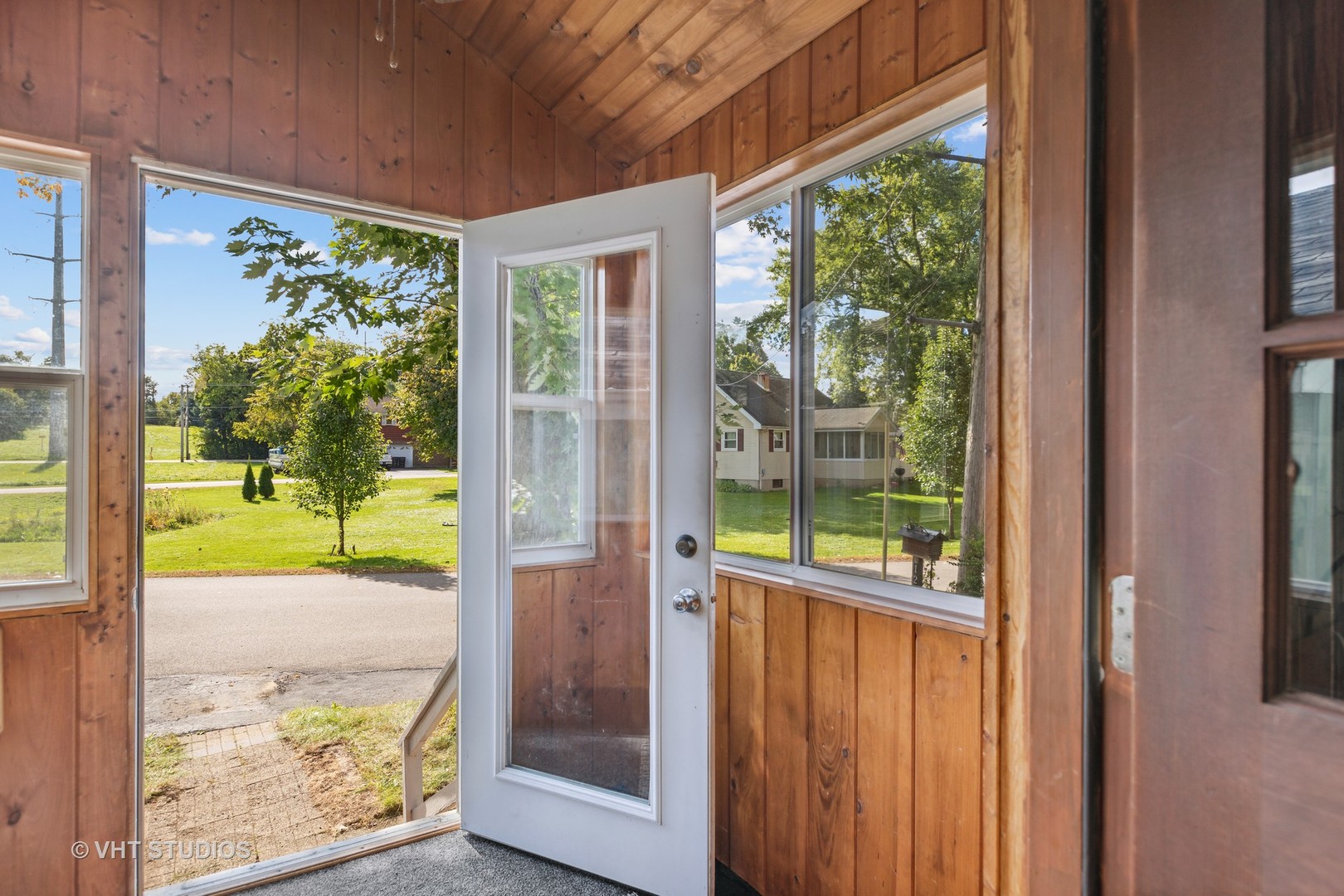 1200 Bayview Road Fox River Grove, IL 60021 - Photo 2 of 21 a view of a porch with a floor to ceiling window