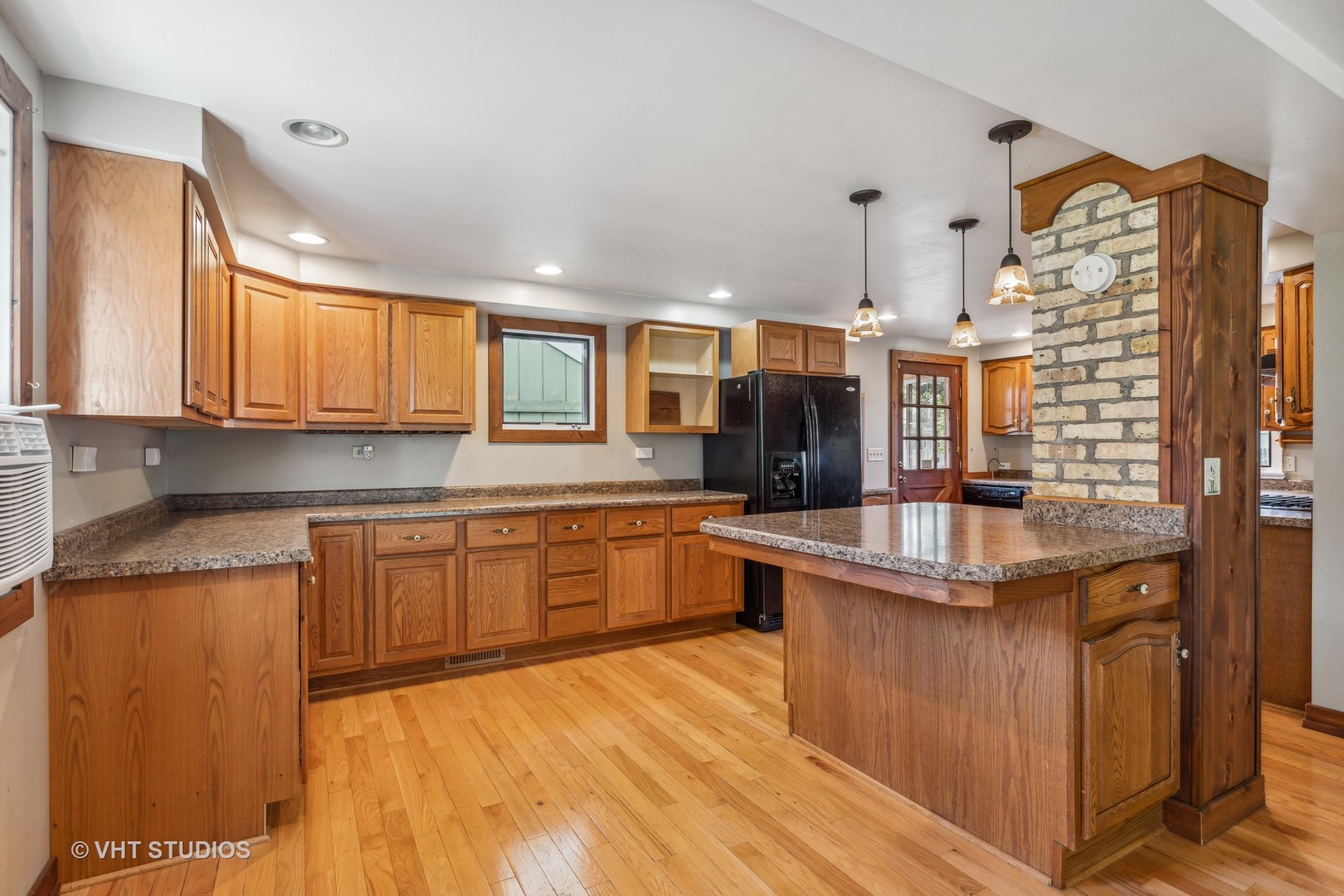 1200 Bayview Road Fox River Grove, IL 60021 - Photo 4 of 21 a large kitchen with stainless steel appliances granite countertop a stove and cabinets