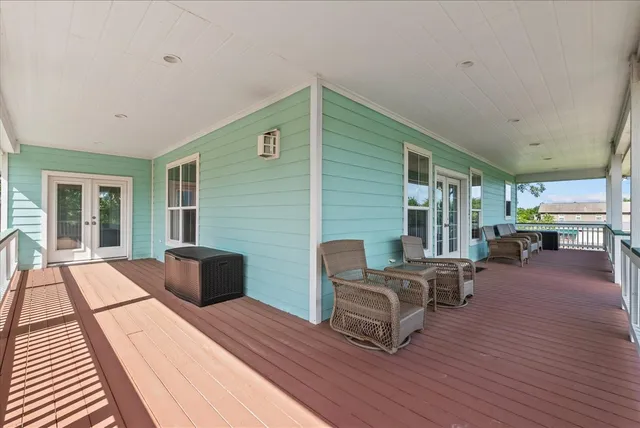 a view of a balcony with furniture