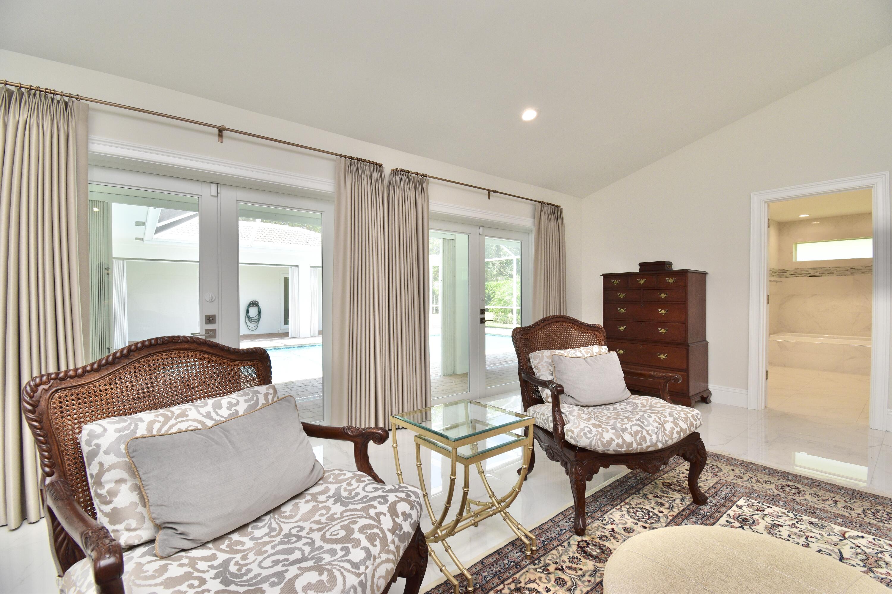 20954 Cipres Way Boca Raton, FL 33433 - Photo 34 of 65 a living room with furniture and a window