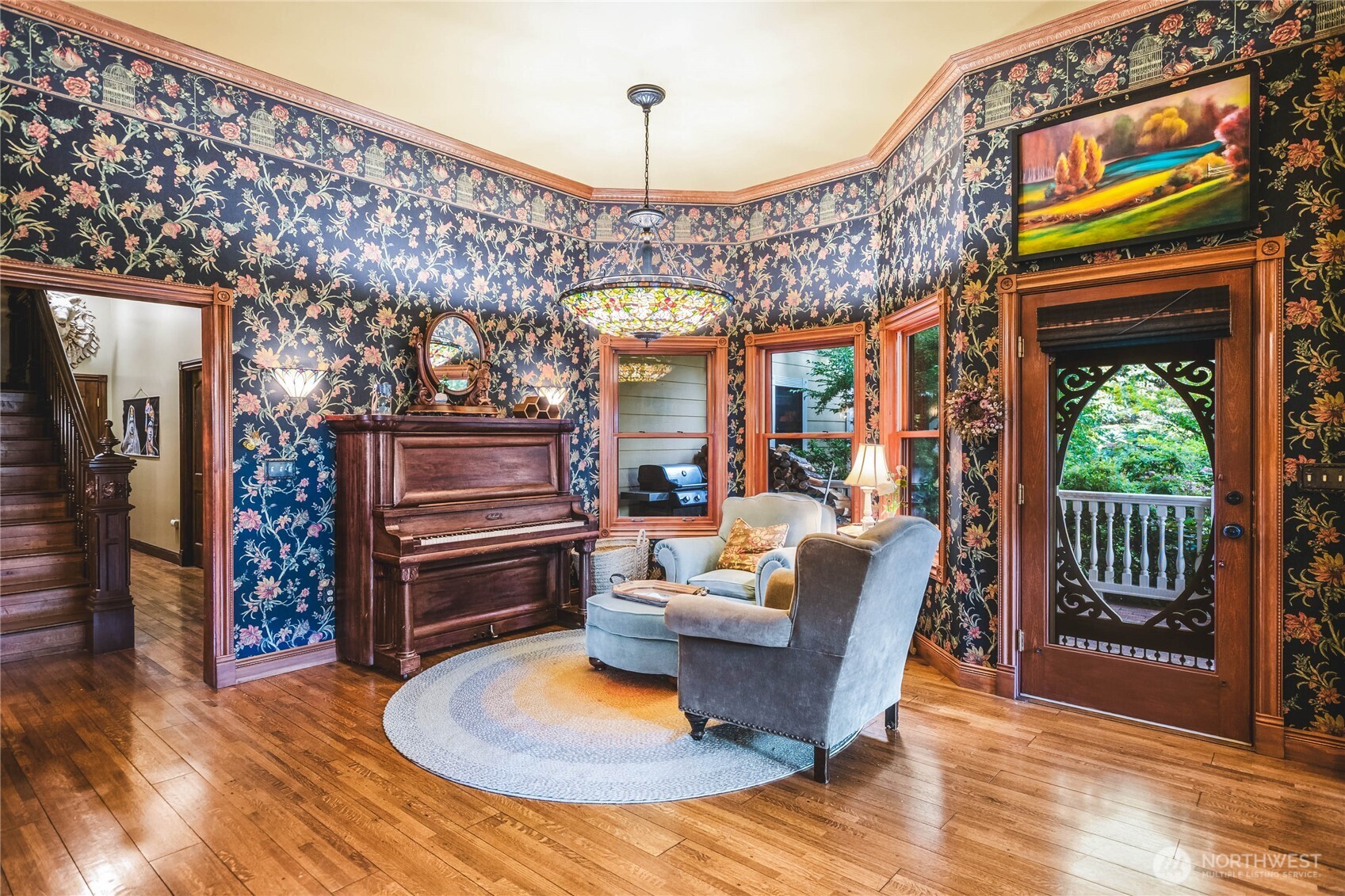 1656 Eagle Ridge Road Orcas Island, WA 98245 - Photo 12 of 40 a living room with furniture a flat screen tv and floor to ceiling window