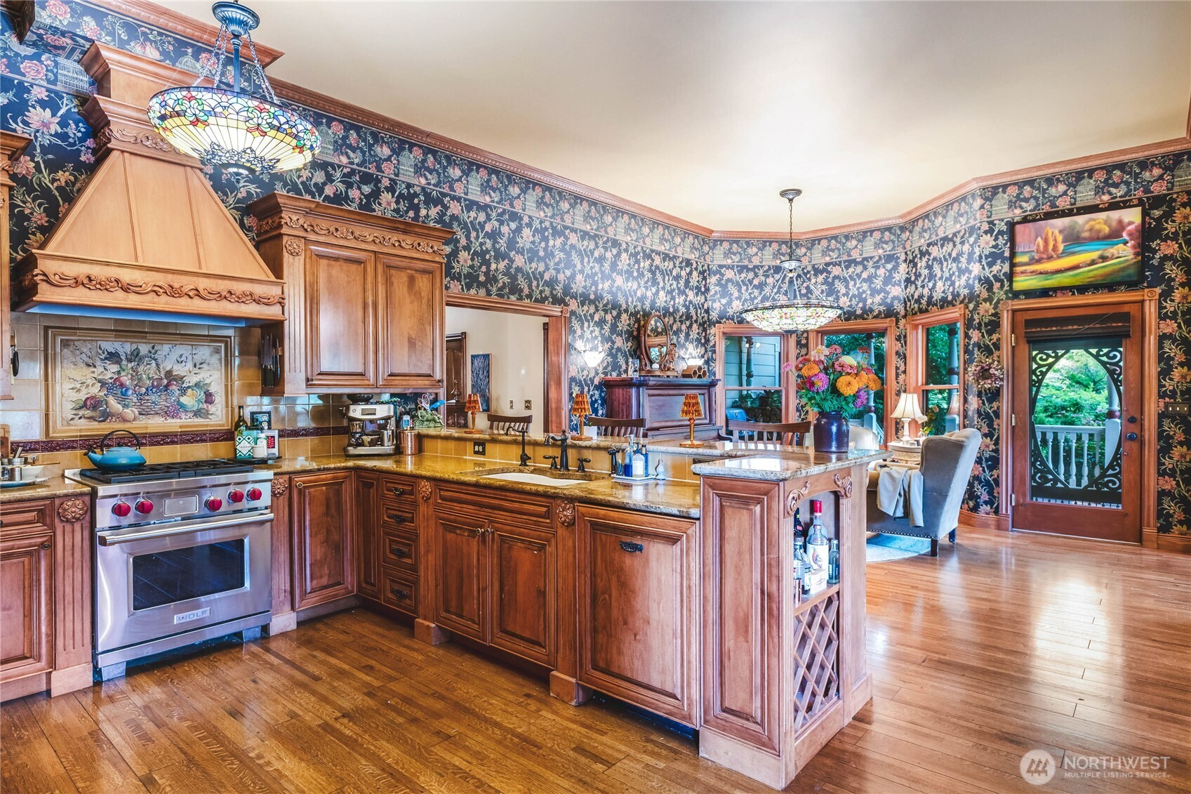 1656 Eagle Ridge Road Orcas Island, WA 98245 - Photo 14 of 40 a open kitchen with stainless steel appliances granite countertop a stove and a wooden floors