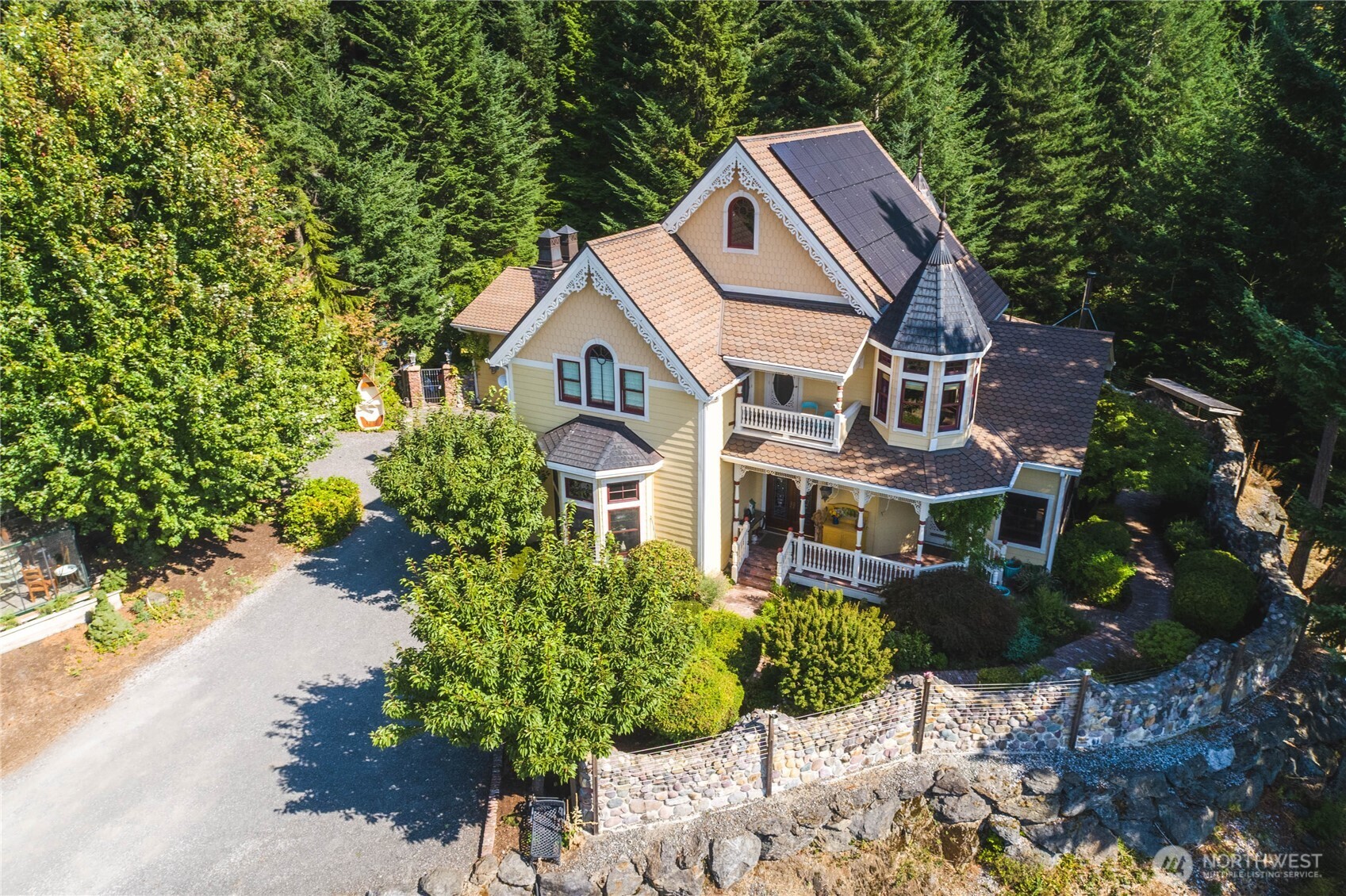 1656 Eagle Ridge Road Orcas Island, WA 98245 - Photo 2 of 40 a aerial view of a house with a yard and potted plants