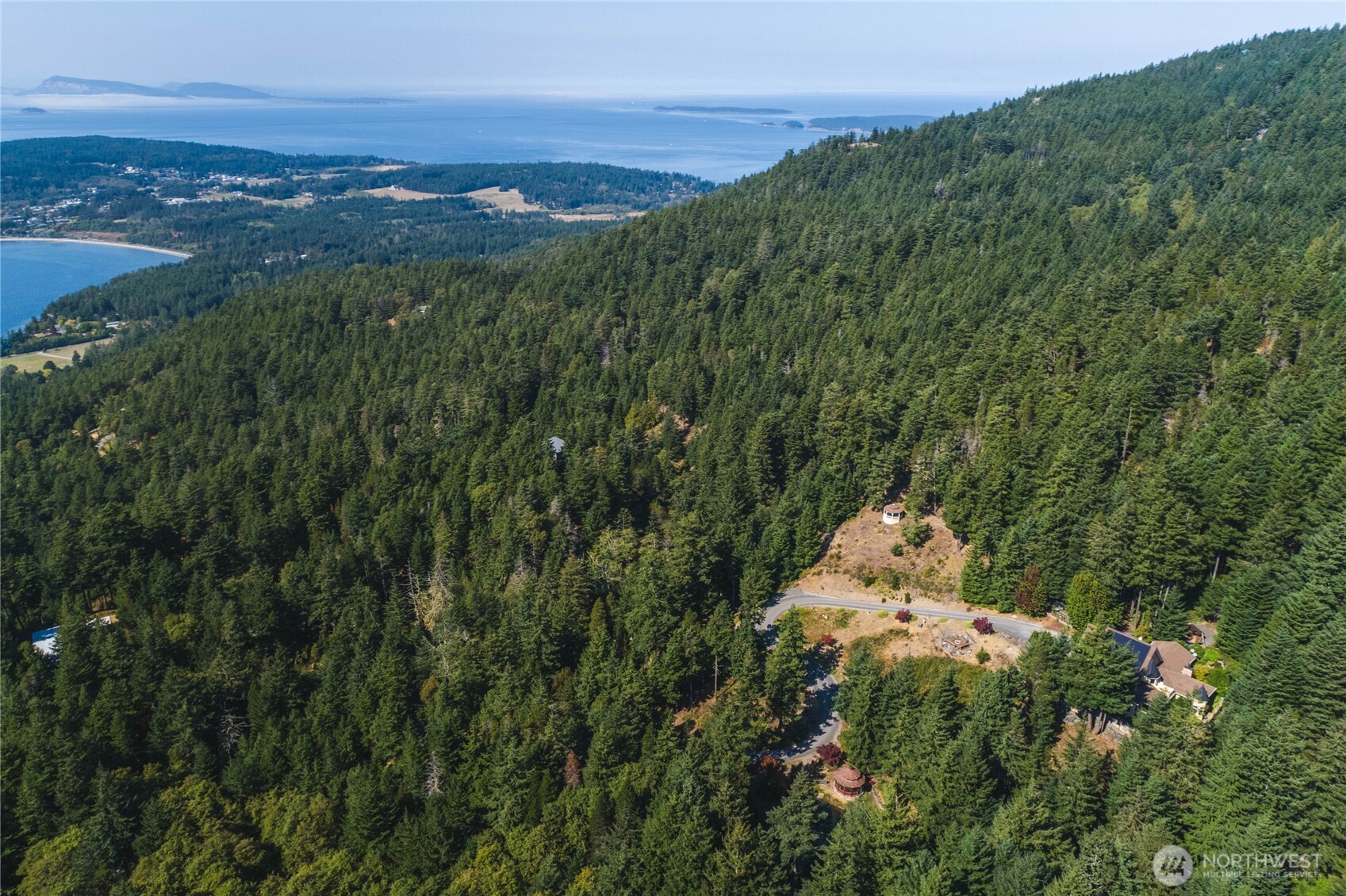 1656 Eagle Ridge Road Orcas Island, WA 98245 - Photo 36 of 40 a view of a lake with a city