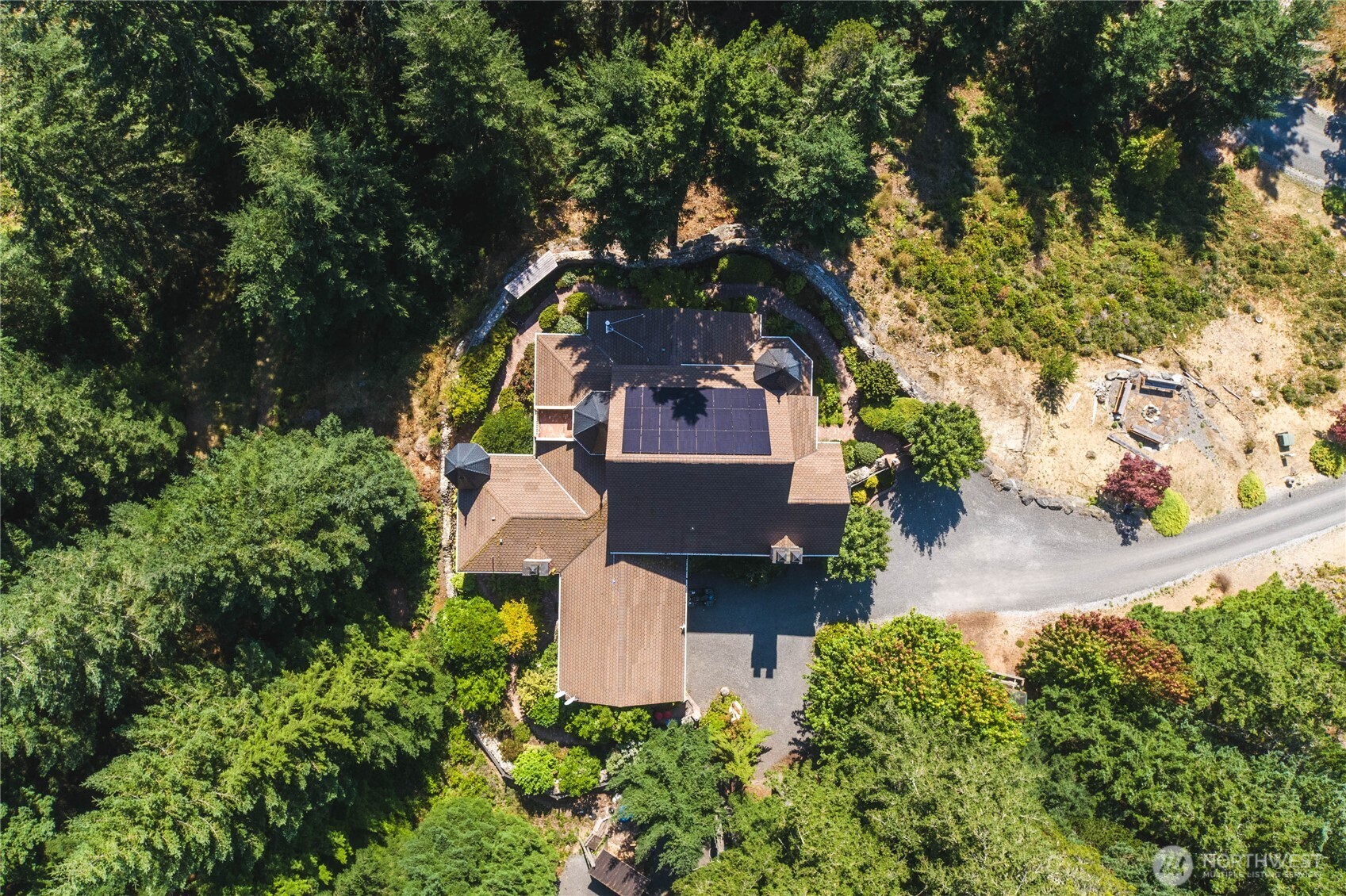 1656 Eagle Ridge Road Orcas Island, WA 98245 - Photo 38 of 40 an aerial view of a house with a yard and garden