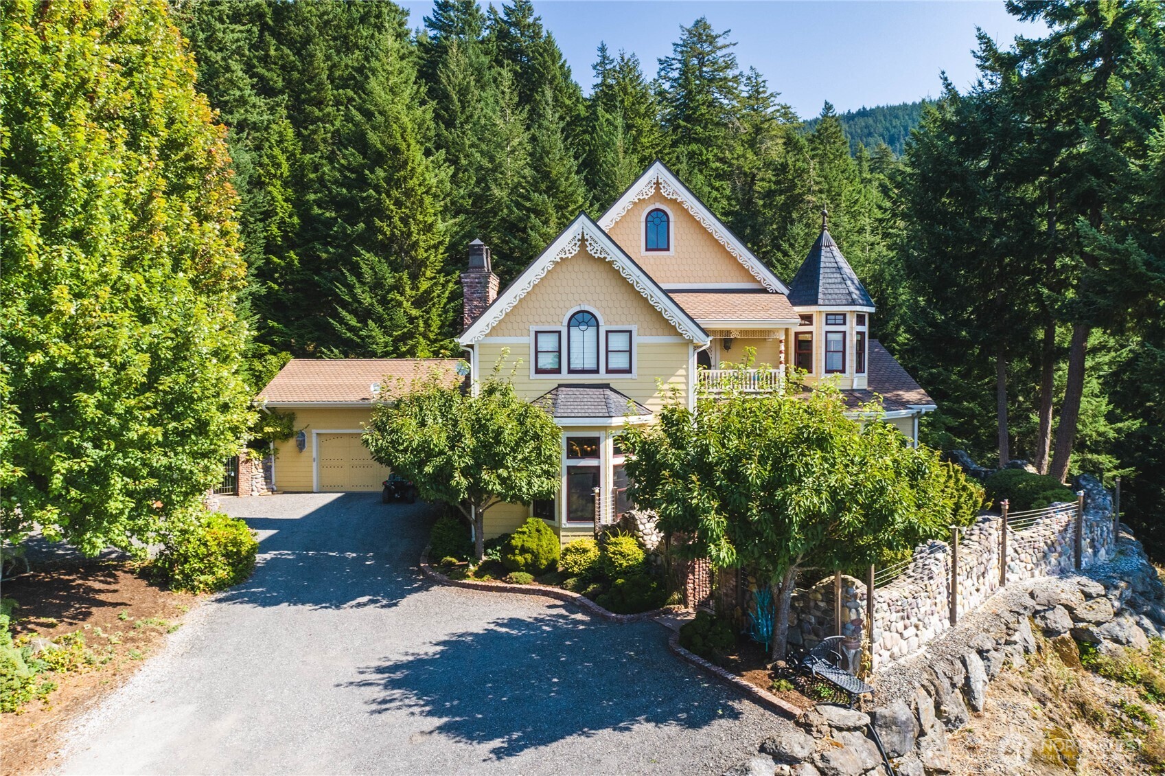 1656 Eagle Ridge Road Orcas Island, WA 98245 - Photo 40 of 40 a front view of a house with a garden