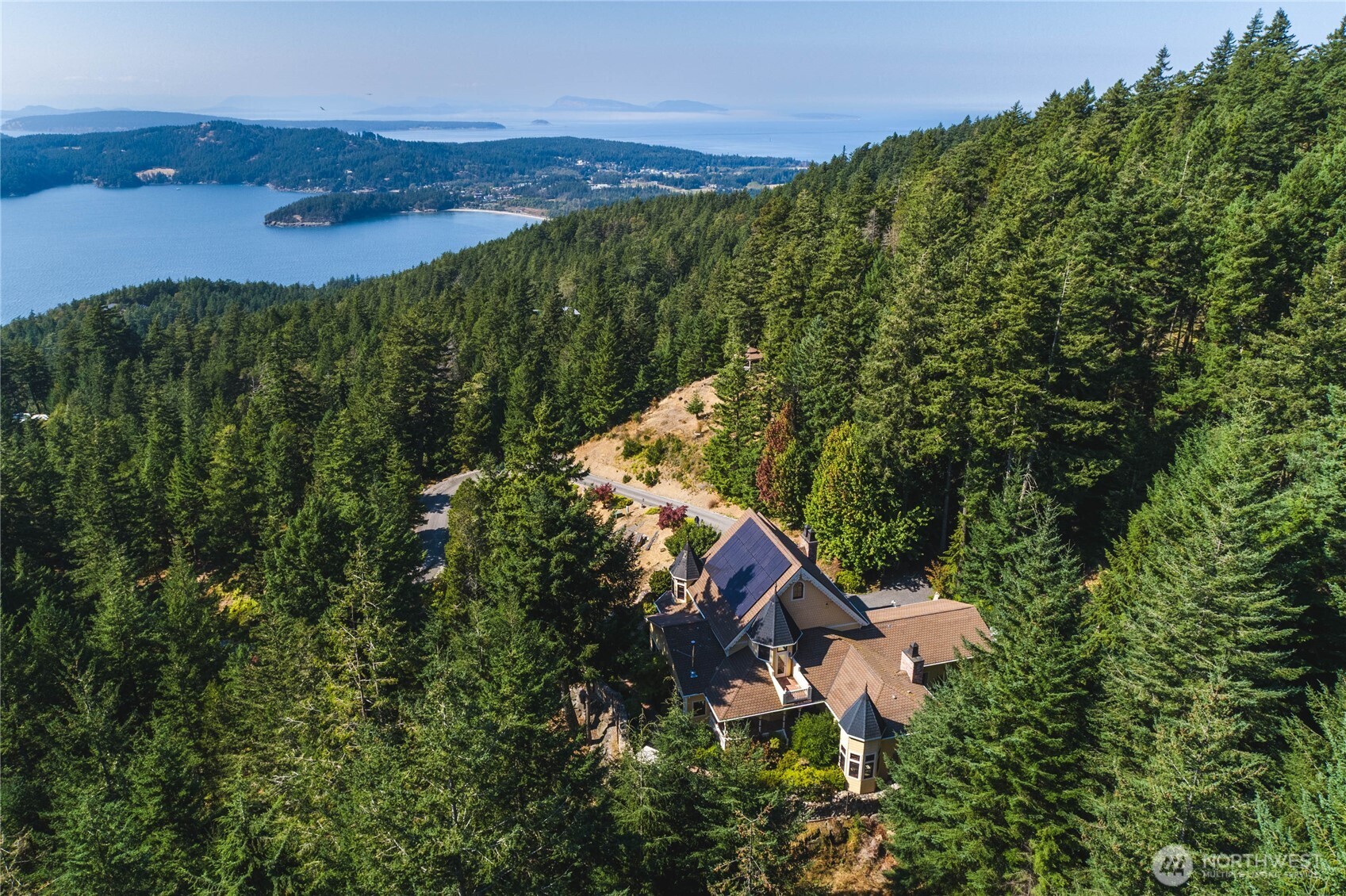 1656 Eagle Ridge Road Orcas Island, WA 98245 - Photo 4 of 40 an aerial view of a house with mountain view