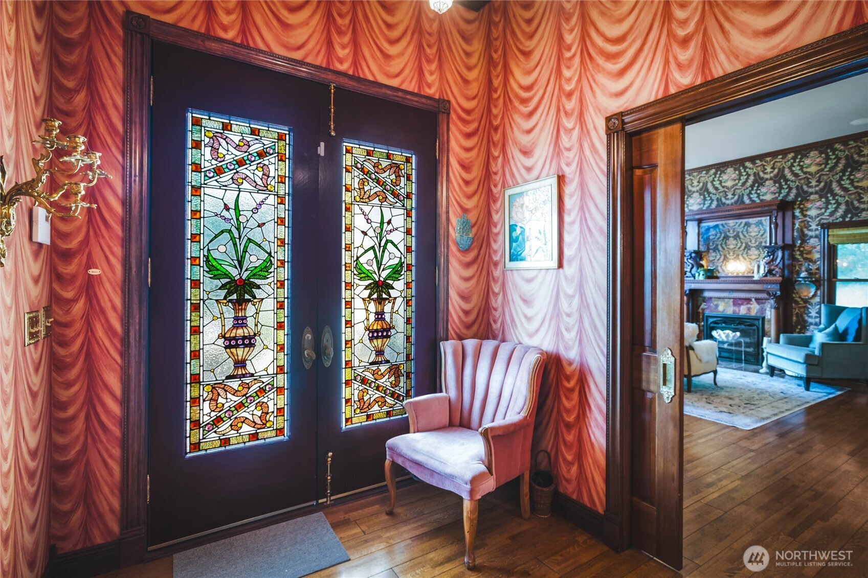 1656 Eagle Ridge Road Orcas Island, WA 98245 - Photo 7 of 40 a view of a porch with a chairs and a potted plant