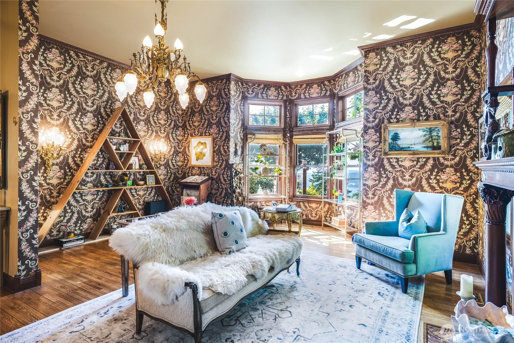 1656 Eagle Ridge Road Orcas Island, WA 98245 - Photo 9 of 40 a living room with furniture and a chandelier