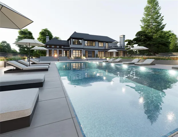 a front view of a house with garden and patio