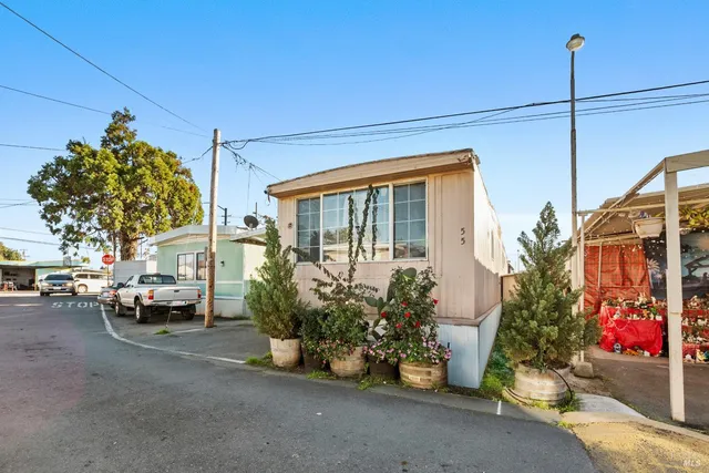 a view of a street with cars