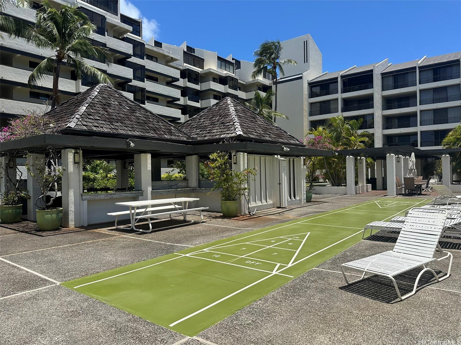 500 Lunalilo Home Road, Unit 22C Honolulu, HI 96825 - Photo 23 of 25 The quite deck offers a shuffleboard area, extra tables & couches.