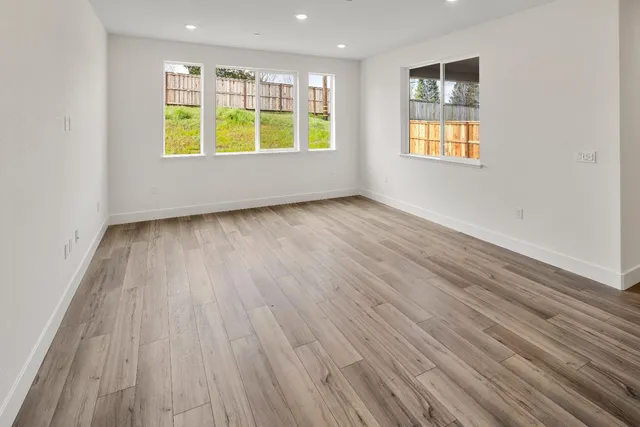 an empty room with windows