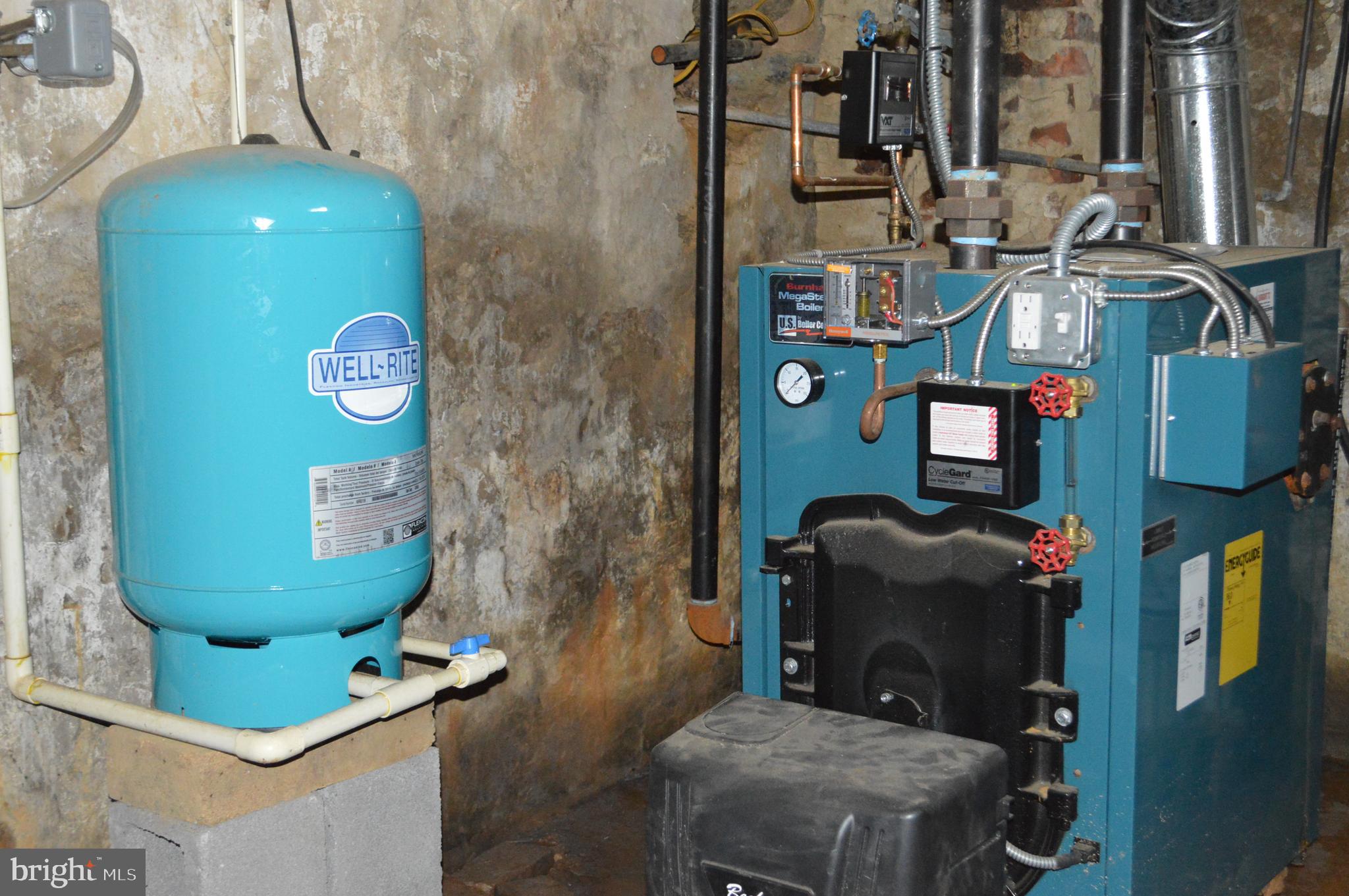 3903 Street Road Street, MD 21154 - Photo 33 of 50 Water filter in basement, next to boiler