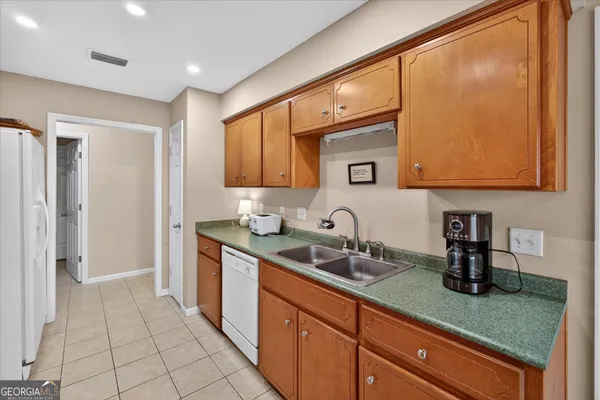 a view of a workspace with furniture