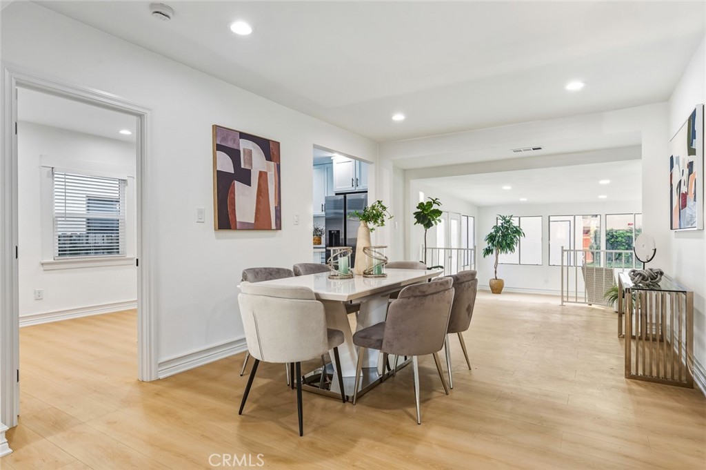 1065 Bennett Avenue Long Beach, CA 90804 - Photo 21 of 44 a view of a dining room with furniture window and outside view