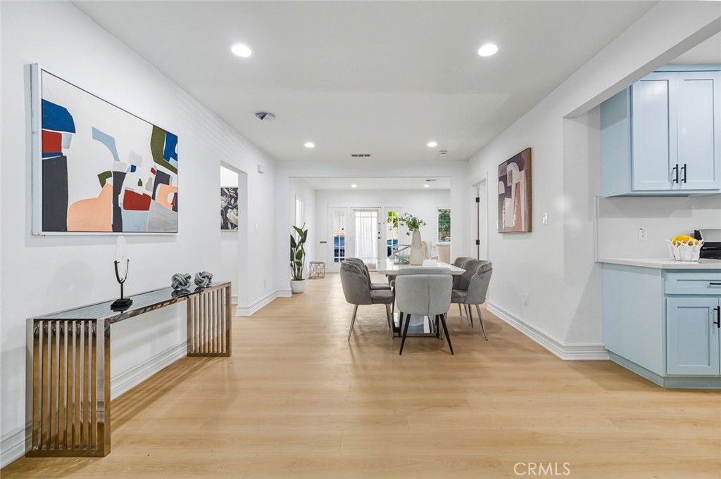 1065 Bennett Avenue Long Beach, CA 90804 - Photo 22 of 44 a view of a dining room with furniture kitchen and wooden floor