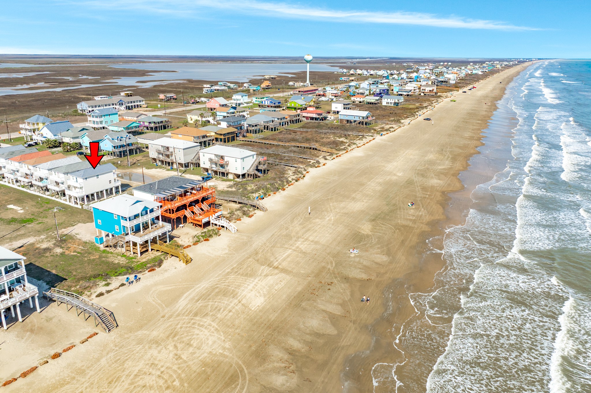 107 Howard Avenue Surfside Beach, TX 77541 - Photo 11 of 38 Located within a vibrant coastal community featuring elevated homes and panoramic beach and bay surroundings.