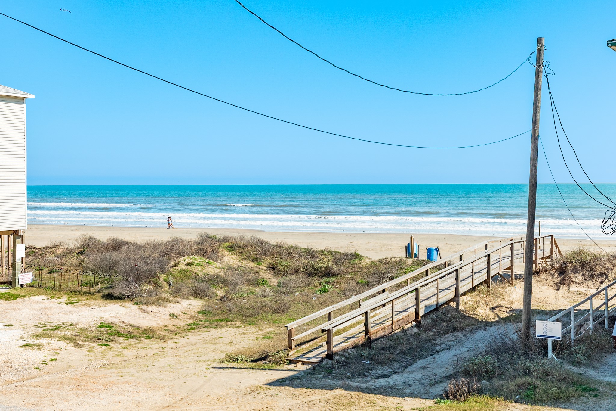 107 Howard Avenue Surfside Beach, TX 77541 - Photo 18 of 38 Convenient nearby boardwalk provides easy access directly to the sandy shoreline.