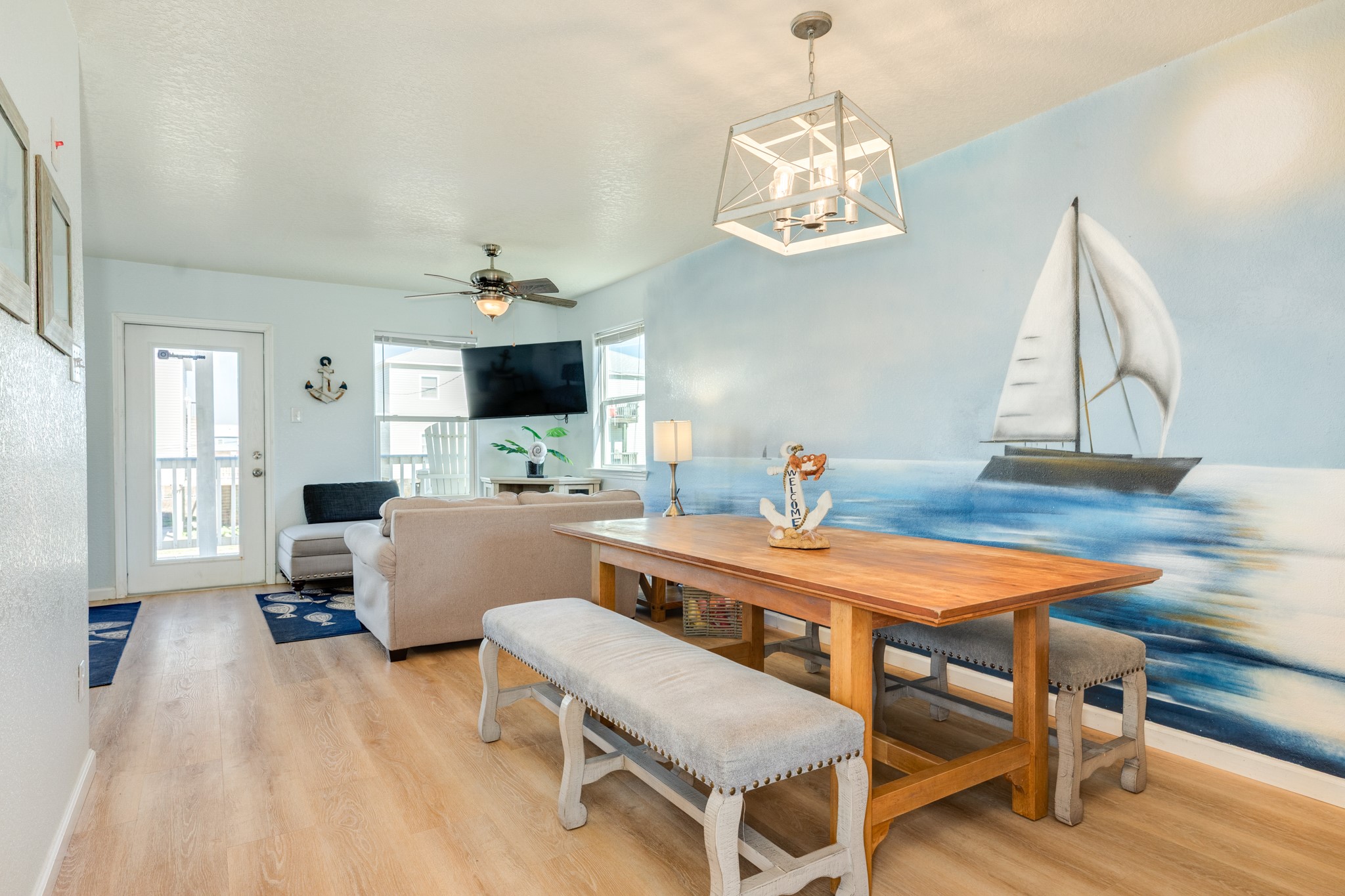 107 Howard Avenue Surfside Beach, TX 77541 - Photo 22 of 38 Open and airy dining area overlooking the living space, designed for easy flow and comfortable everyday living.