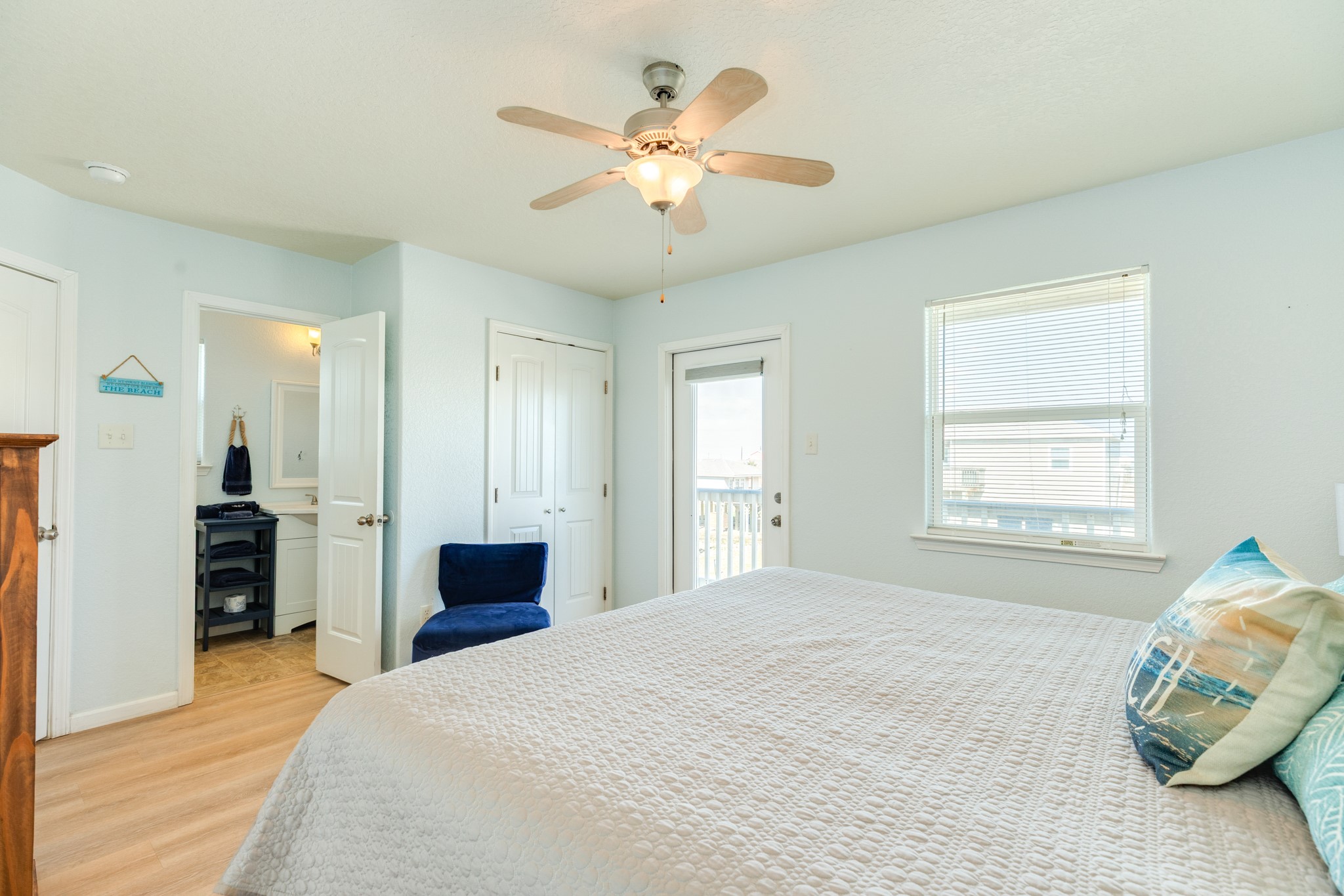 107 Howard Avenue Surfside Beach, TX 77541 - Photo 28 of 38 Light-filled retreat with ceiling fan, generous floor space, and convenient access to the en-suite bath.